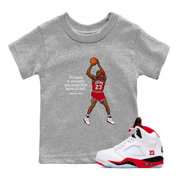 Michael Jordan Quotes To Learn To Succeed You Must First Learn To Fail baby and kids t-shirt crafted for little sneakerheads to shine with the Air Jordan 5 Fire Red sneakers, displayed in Heather Grey 1.