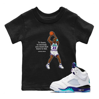 Michael Jordan Quotes To Learn To Succeed You Must First Learn To Fail baby and kids t-shirt crafted for little sneakerheads to shine with the Air Jordan 5 Grape sneakers, displayed in Black 1.