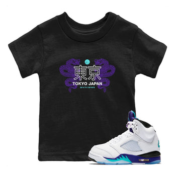 Tokyo Dragons baby and kids t-shirt crafted for little sneakerheads to shine with the Air Jordan 5 Grape sneakers, displayed in Black 1.