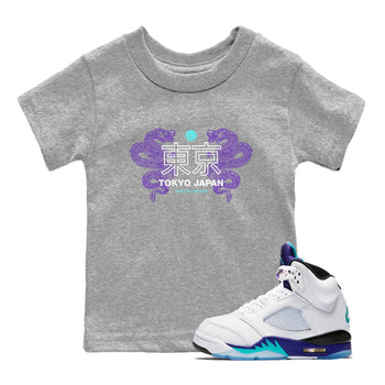 Tokyo Dragons baby and kids t-shirt crafted for little sneakerheads to shine with the Air Jordan 5 Grape sneakers, displayed in Heather Grey 1.