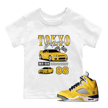 Tokyo Drift Mode baby and kids t-shirt crafted for little sneakerheads to with the Air Jordan 5 Tokyo sneakers, displayed in White 1.