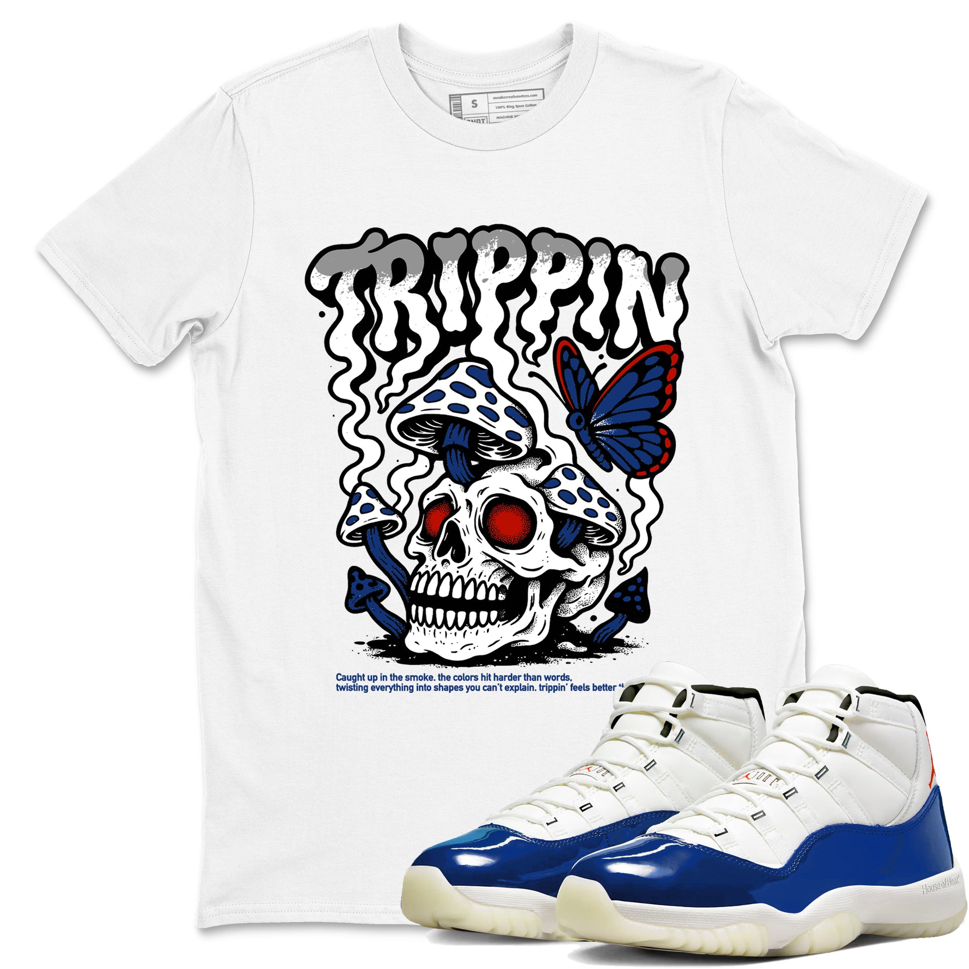 White t-shirt with skull and butterfly design, paired with blue and white sneakers on a white background