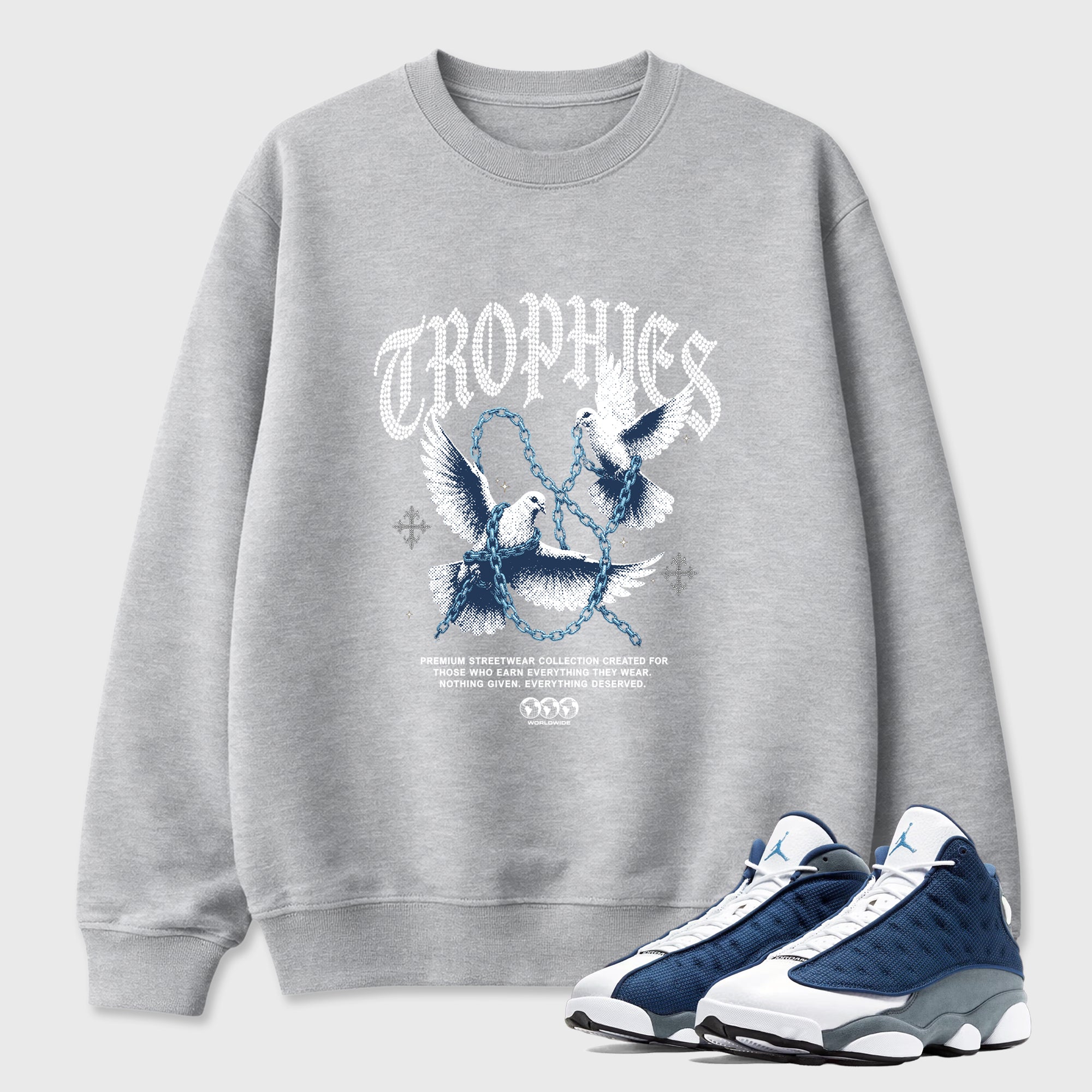 Trophies Graphic T-Shirt featuring original streetwear artwork designed to match the Air Jordan 13 Flint. Heather Grey 1 Graphic Tee.