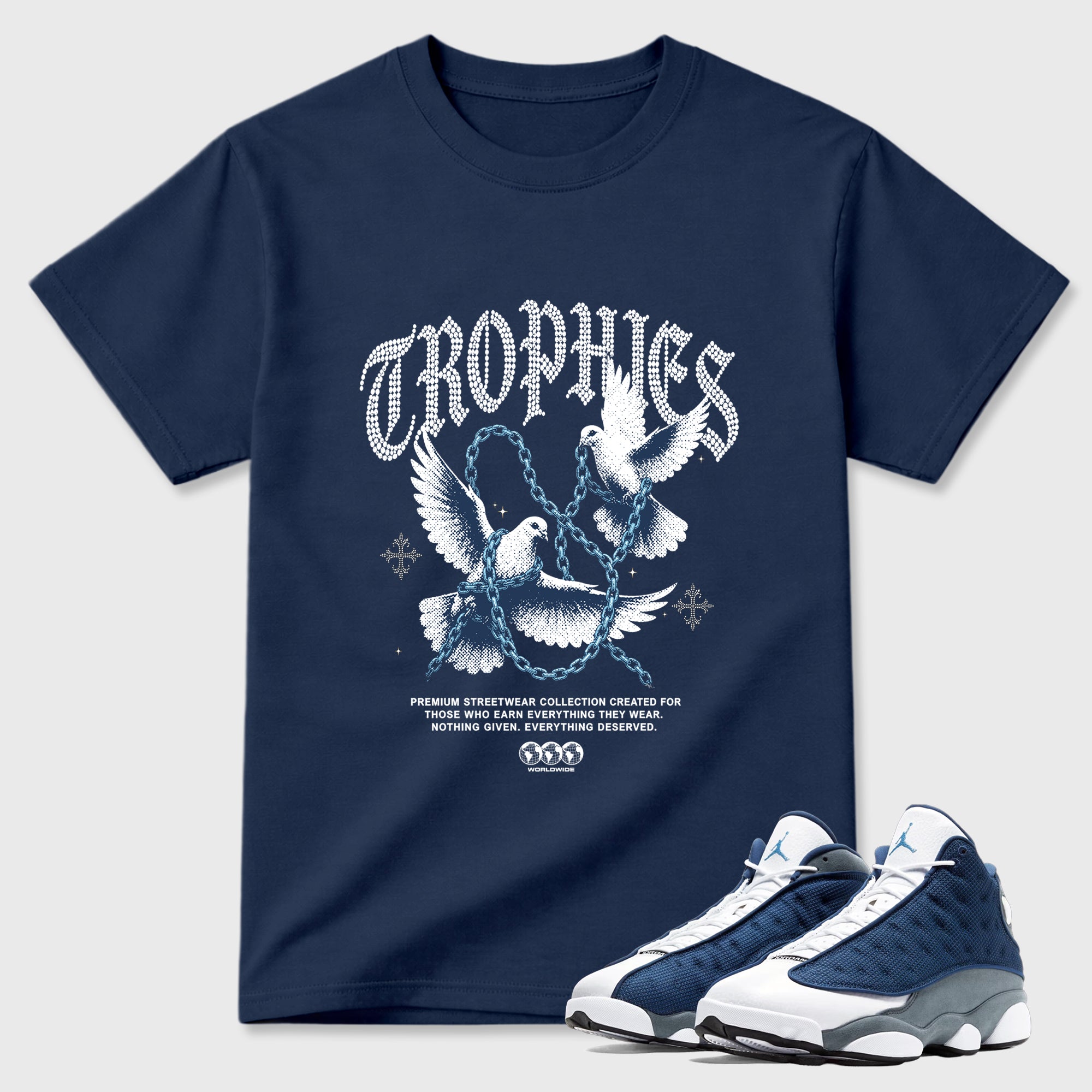 Trophies Graphic T-Shirt featuring original streetwear artwork designed to match the Air Jordan 13 Flint. Navy 1 Graphic T-Shirt.