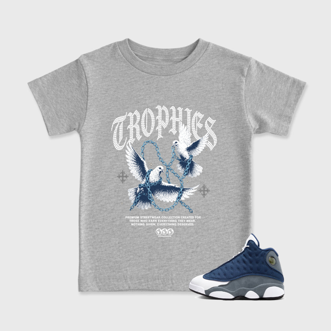 Trophies Baby & Kids Graphic T-Shirt featuring original artwork designed to match the Air Jordan 13 Flint. Heather Grey 1 Kids Graphic Tee.