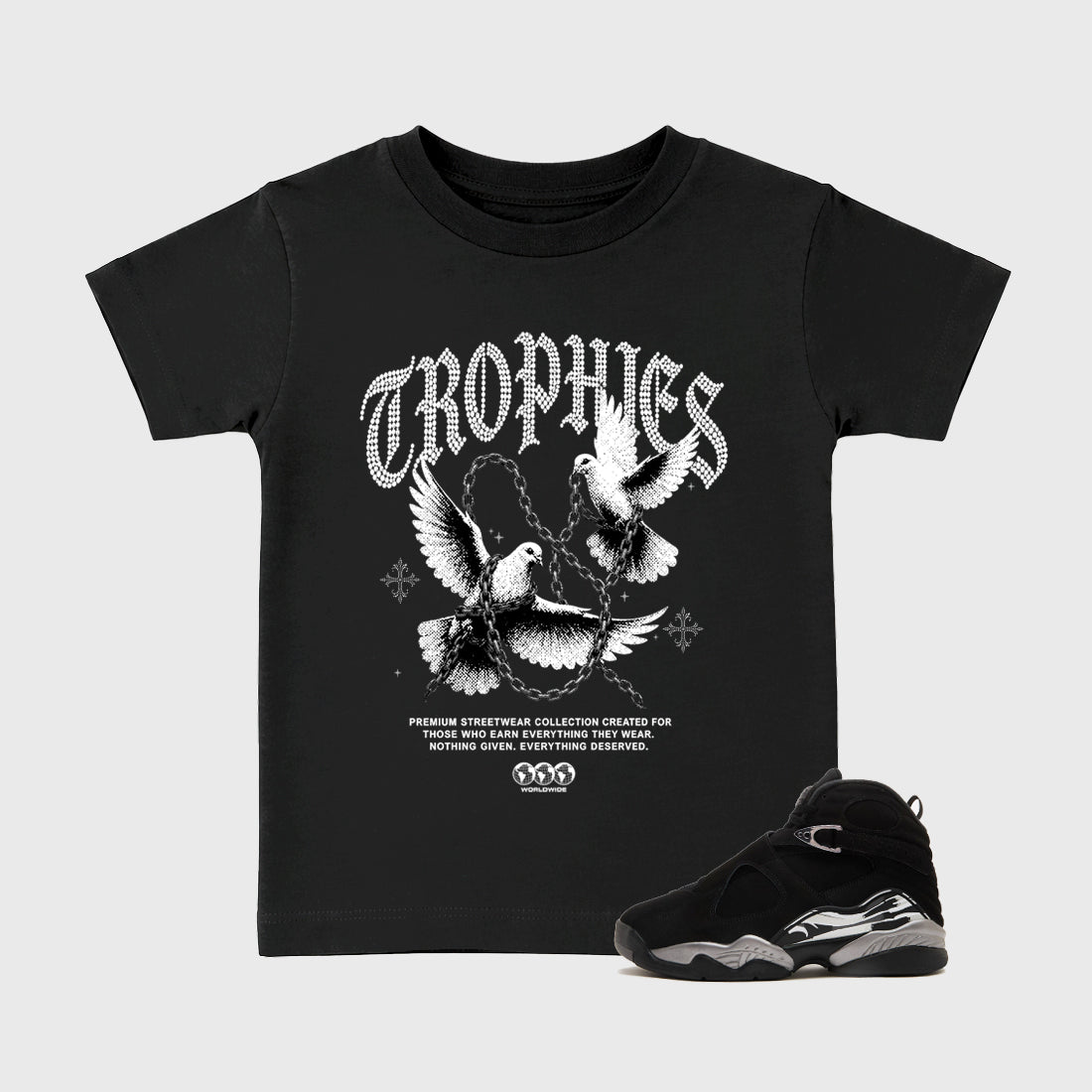 Trophies Baby & Kids Graphic T-Shirt featuring original artwork designed to match the Air Jordan 8 Chrome. Black 1 Kids Graphic Tee.