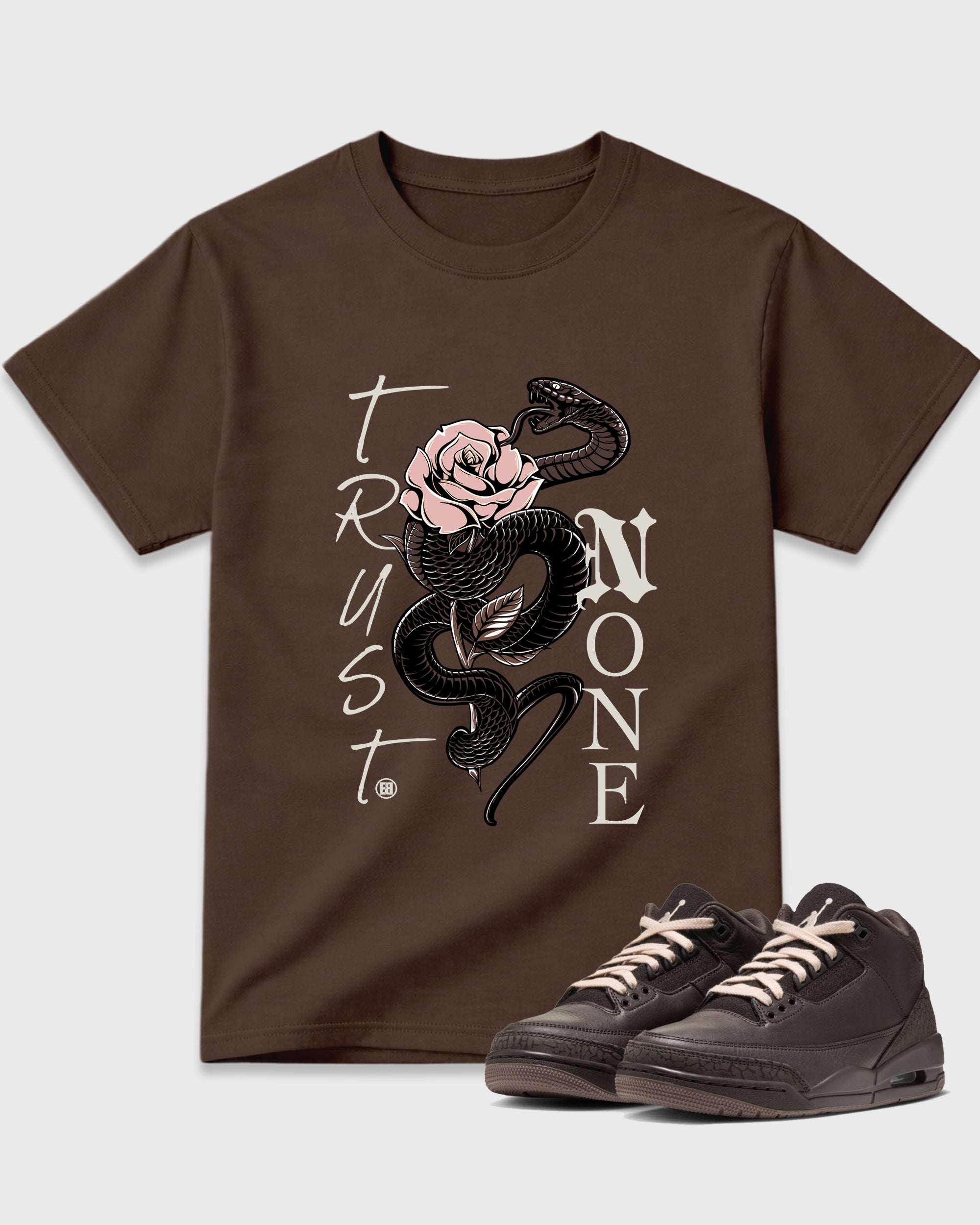 Trust None Graphic T-Shirt featuring original streetwear artwork designed to match the Air Jordan 3 Fireside. Dark Chocolate 1 Graphic T-Shirt.