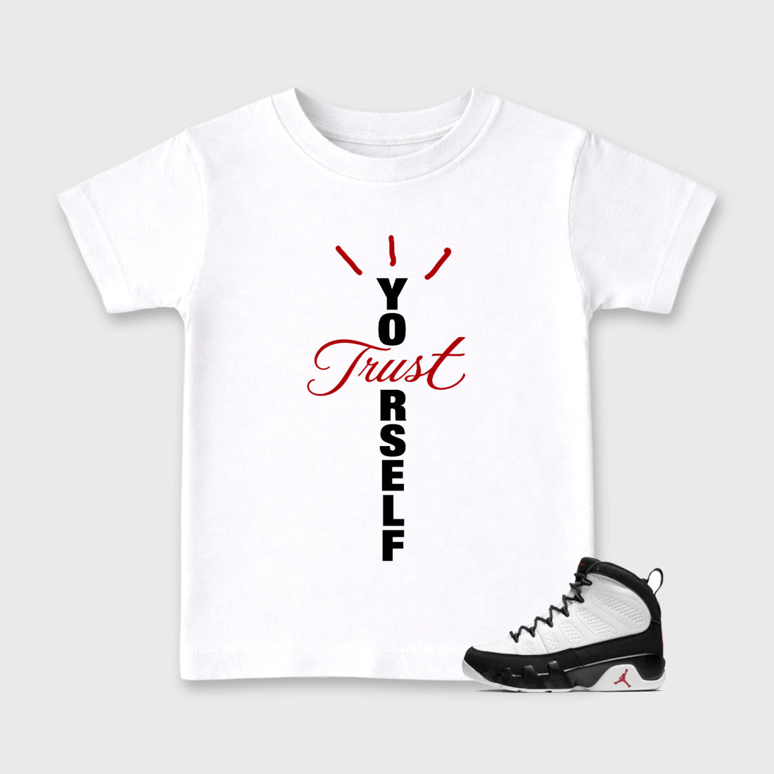 Trust Yourself Baby & Kids Graphic T-Shirt featuring original artwork designed to match the Air Jordan 9 True Red. White 1 Kids Graphic Tee.