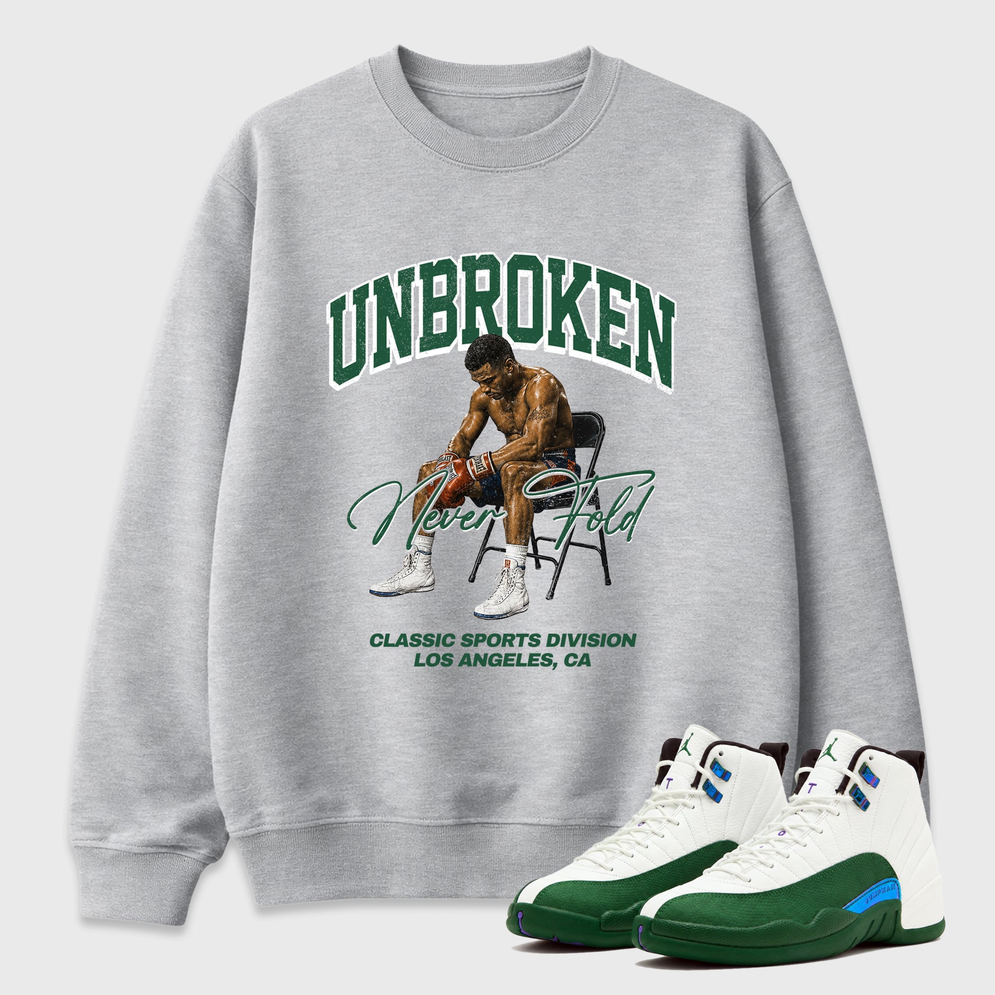 Unbroken Graphic T-Shirt featuring original streetwear artwork designed to match the Air Jordan 12 Summit Green. Heather Grey 1 Graphic Tee.
