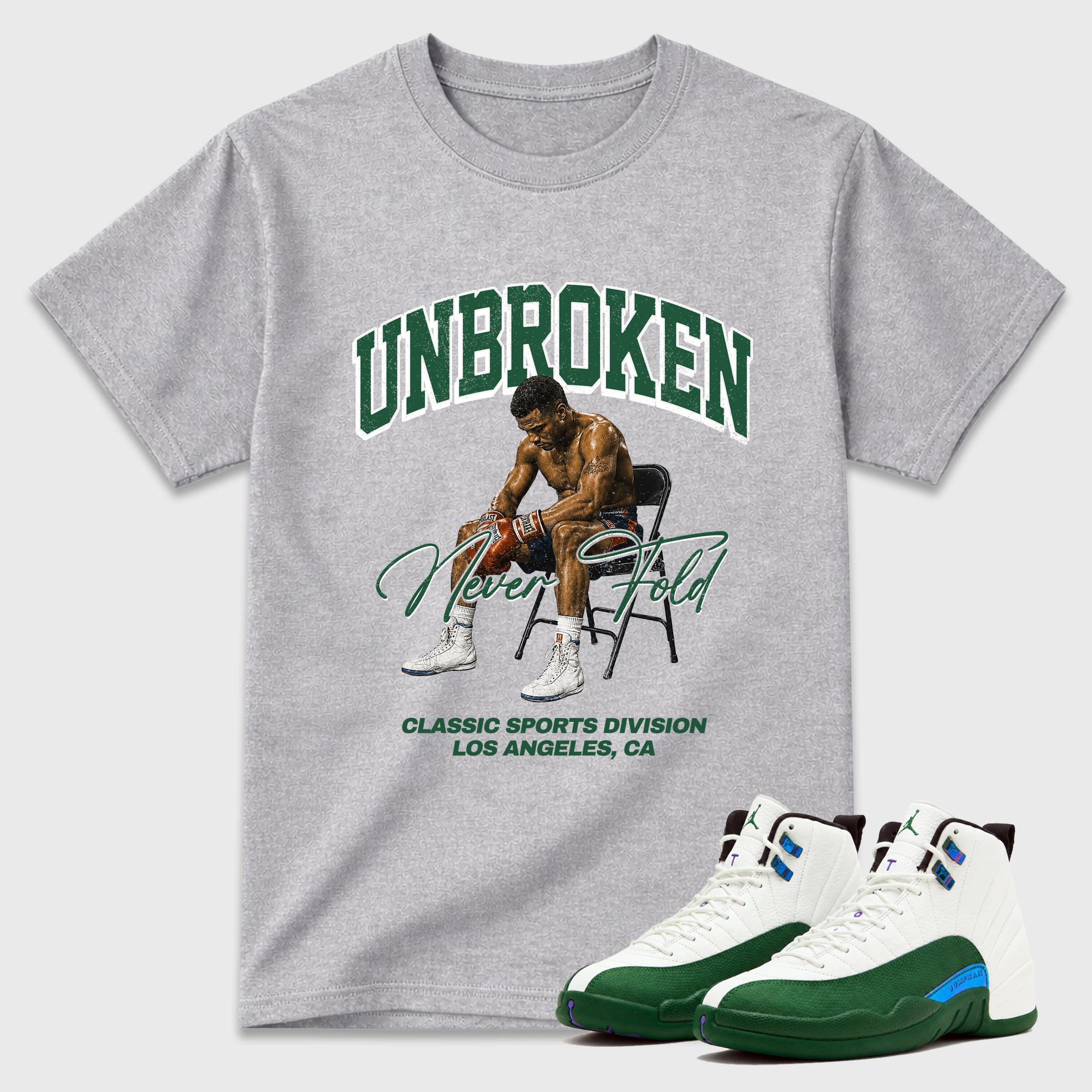 Unbroken Graphic T-Shirt featuring original streetwear artwork designed to match the Air Jordan 12 Summit Green. Heather Grey 1 Graphic T-Shirt.