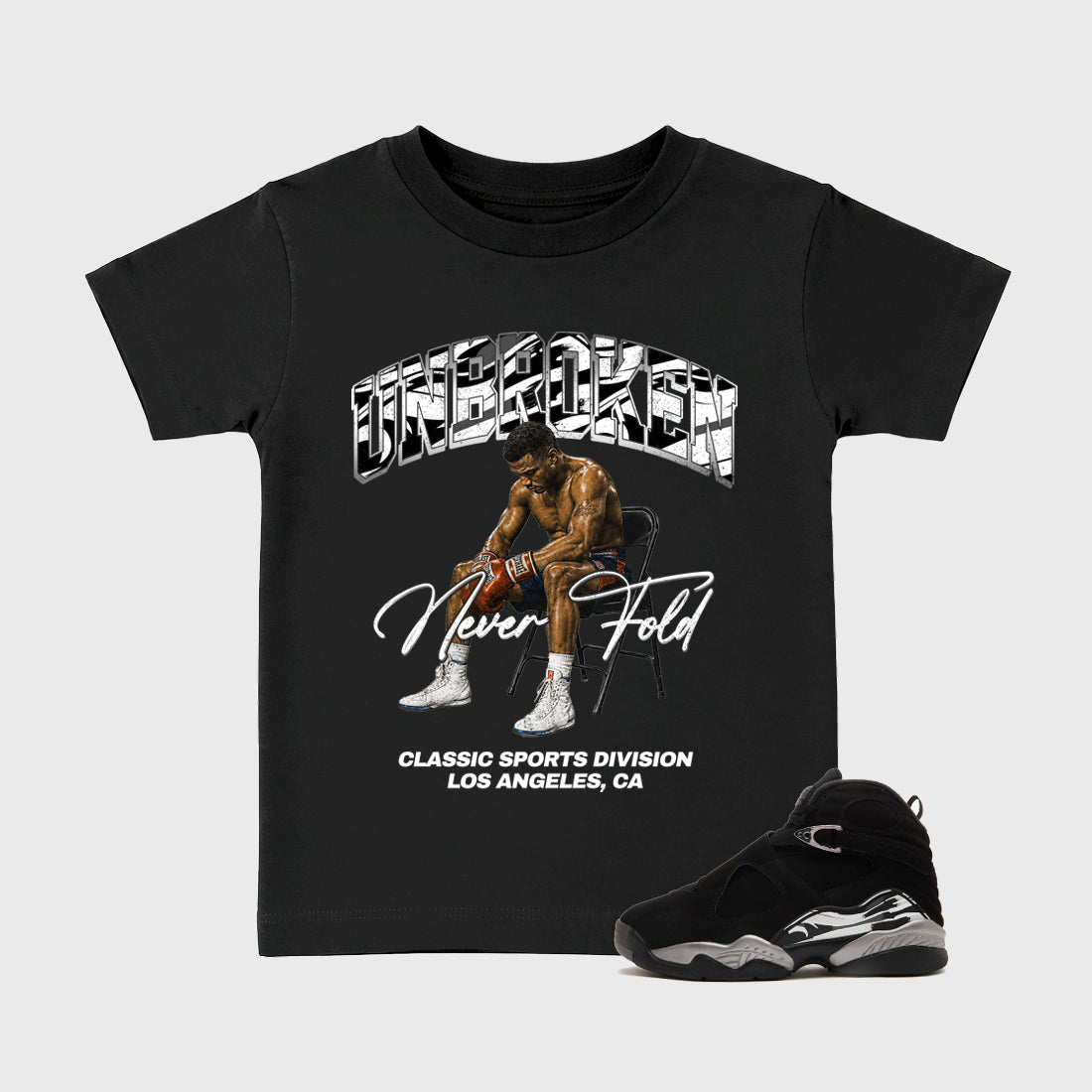 Unbroken Baby & Kids Graphic T-Shirt featuring original artwork designed to match the Air Jordan 8 Chrome. Black 1 Kids Graphic Tee.