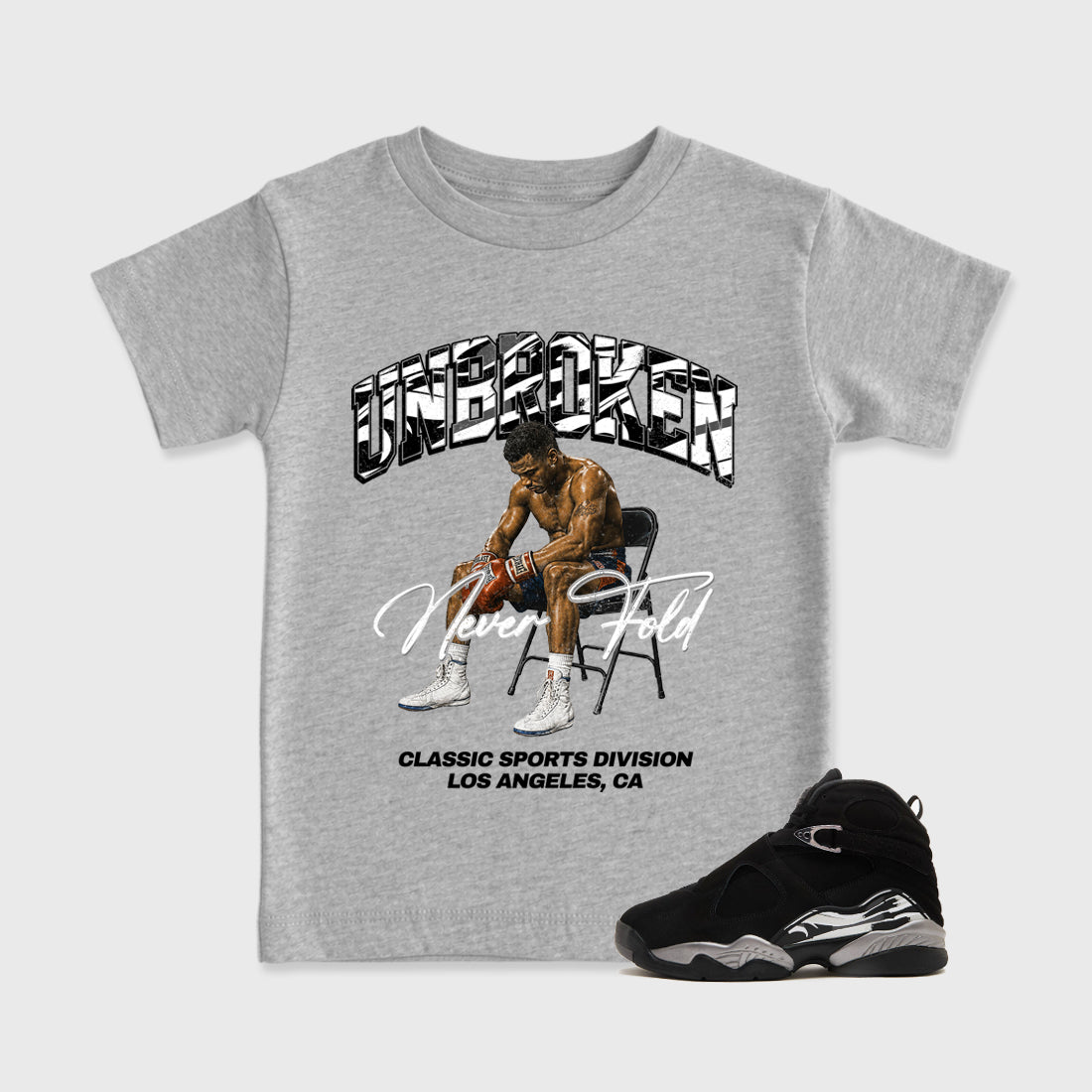 Unbroken Baby & Kids Graphic T-Shirt featuring original artwork designed to match the Air Jordan 8 Chrome. Heather Grey 1 Kids Graphic Tee.
