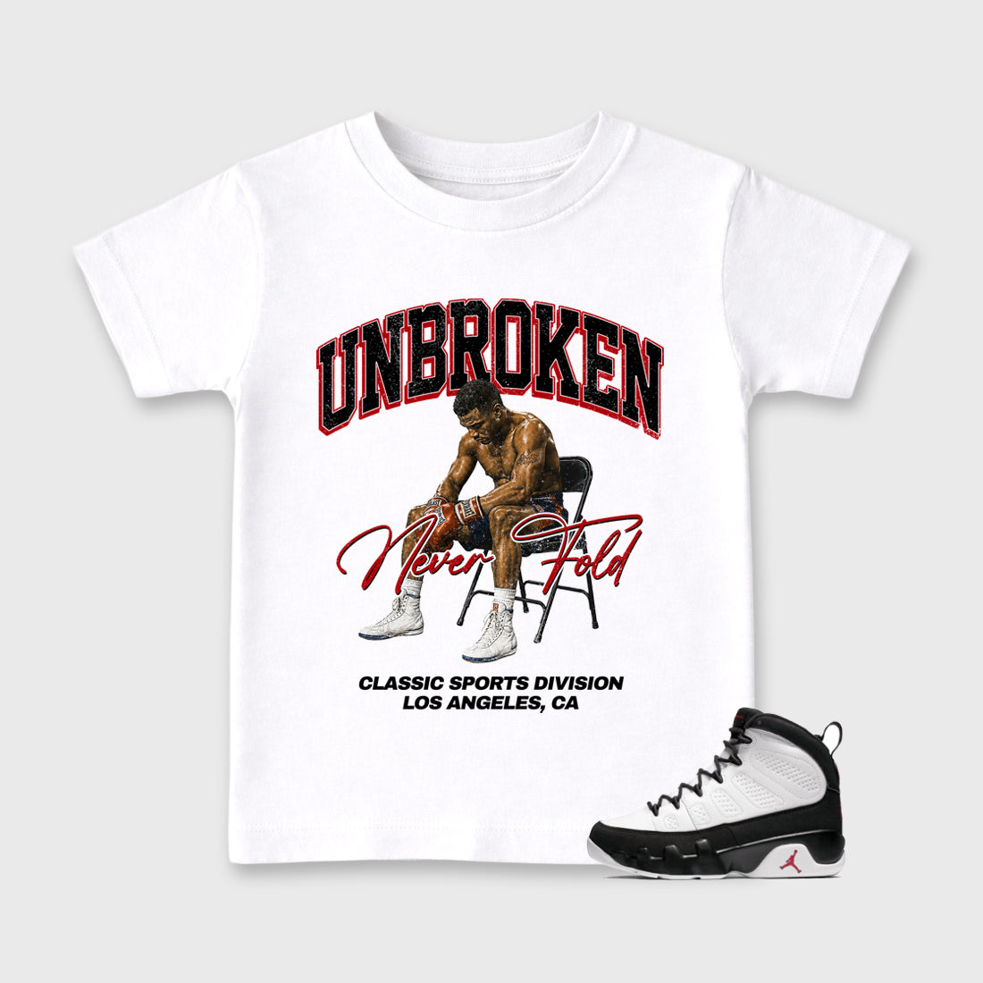 Unbroken Baby & Kids Graphic T-Shirt featuring original artwork designed to match the Air Jordan 9 True Red. White 1 Kids Graphic Tee.