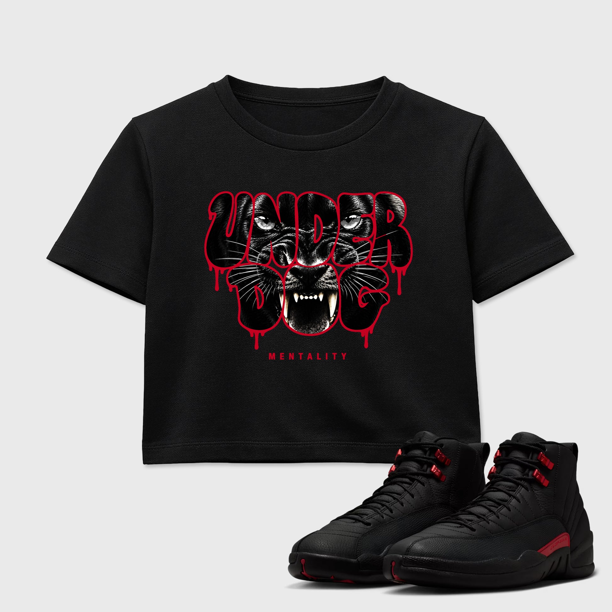 Under Dog Mentality women’s crop tee designed to match the Air Jordan 12 Retro Bloodline, featuring coordinated Black 1 options for a perfect streetwear vibe.