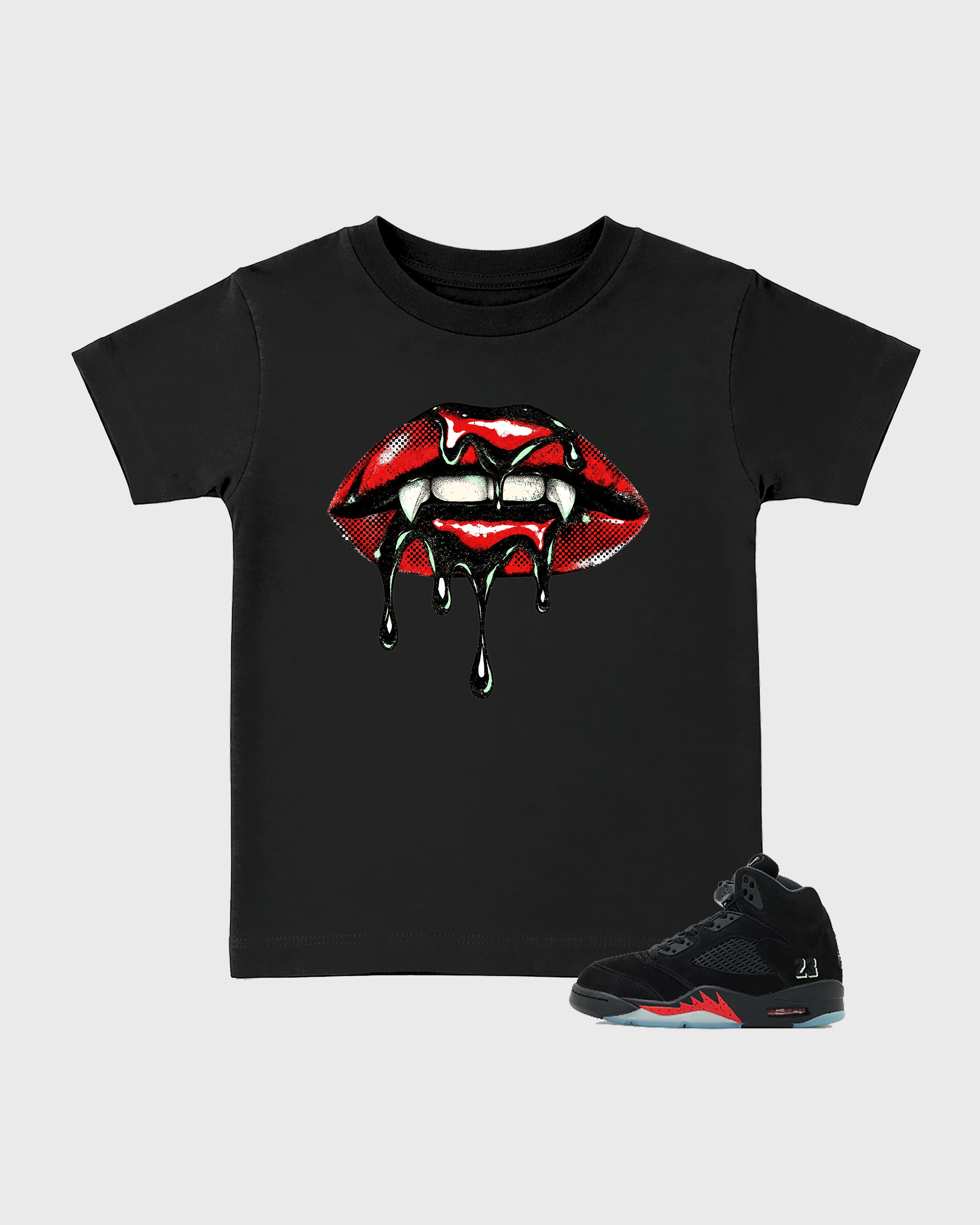Vampire Lips Baby & Kids Graphic T-Shirt featuring original artwork designed to match the Air Jordan 5 Halloween. Black 1 Kids Graphic Tee.