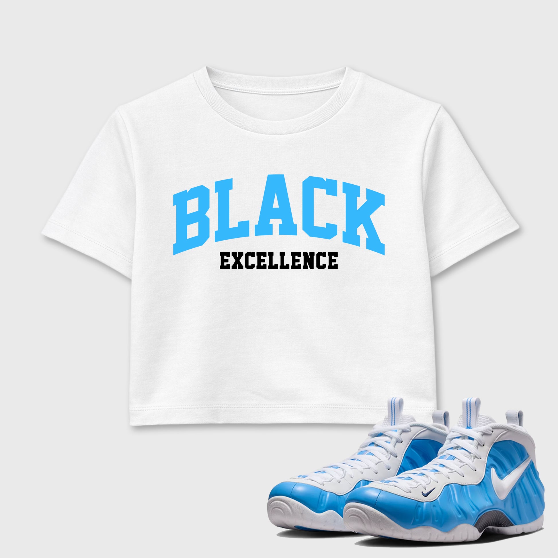 Best Sneakerfit Graphic Tee. Graphic Outfits. Sneaker Tees To Match Air Foamposite Pro University Blue Sneakers – Varsity Black Excellence Crop T-Shirt White 1