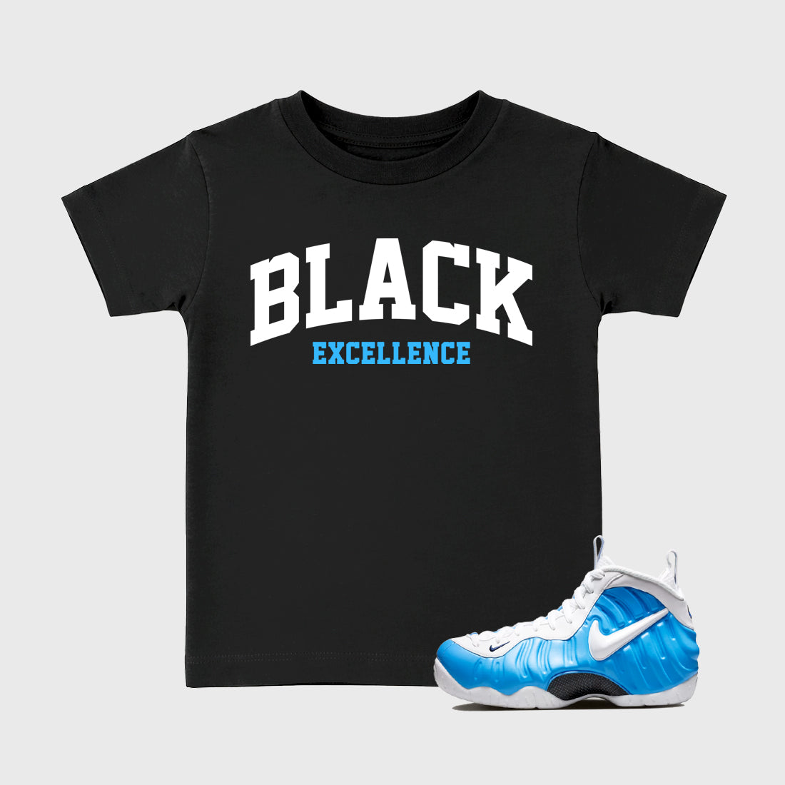 Best Sneakerfit Graphic Tee. Graphic Outfits. Sneaker Tees To Match Air Foamposite Pro University Blue Sneakers – Varsity Black Excellence Kids T-Shirt Black 1