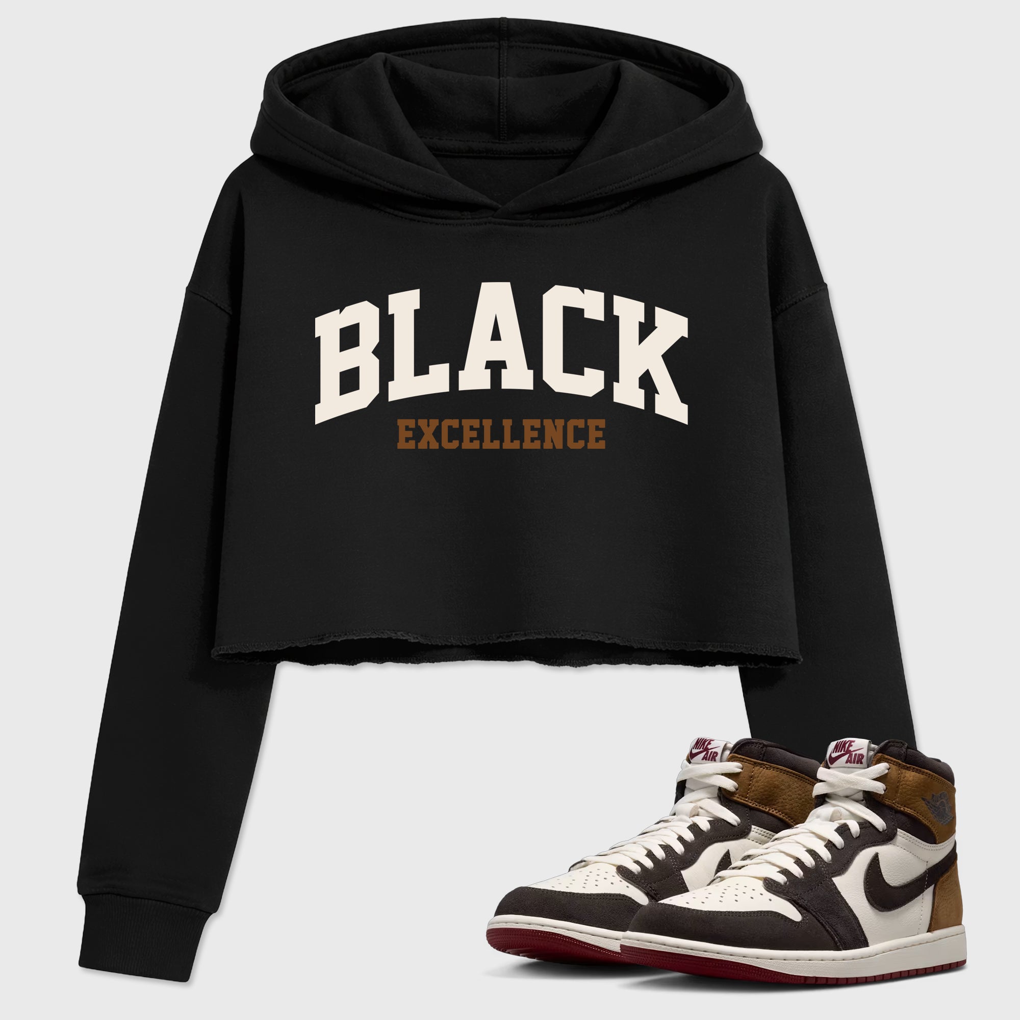 Varsity Black Excellence Women’s Graphic Crop Tee featuring original streetwear artwork designed to match the Air Jordan 1 Love Letter. Black 1 Crop Tee.