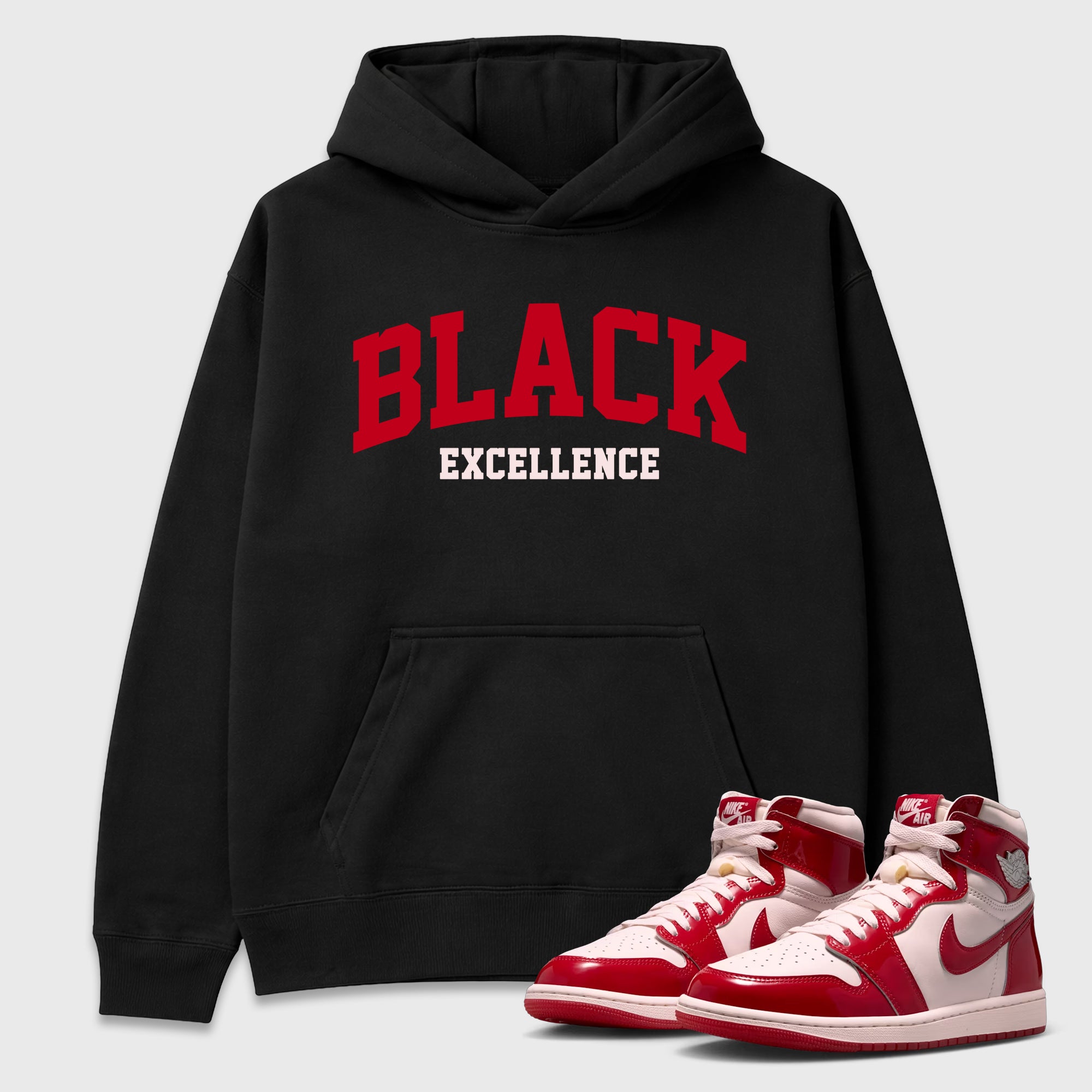 Varsity Black Excellence Graphic T-Shirt featuring original streetwear artwork designed to match the Air Jordan 1 Nails and Grails. Black 1 Graphic Tee.