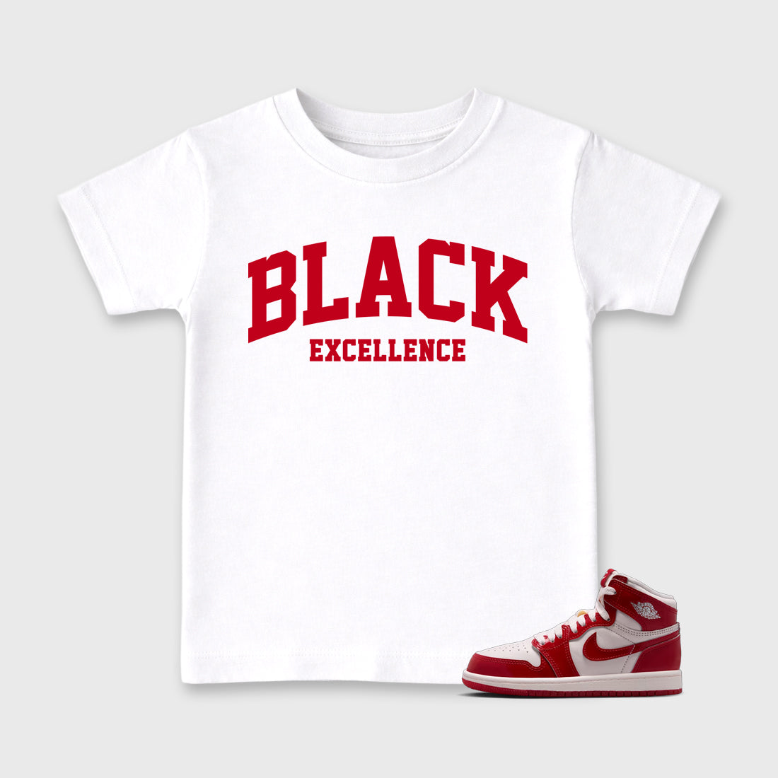 Varsity Black Excellence Baby & Kids Graphic T-Shirt featuring original artwork designed to match the Air Jordan 1 Nails and Grails. White 1 Kids Graphic Tee.