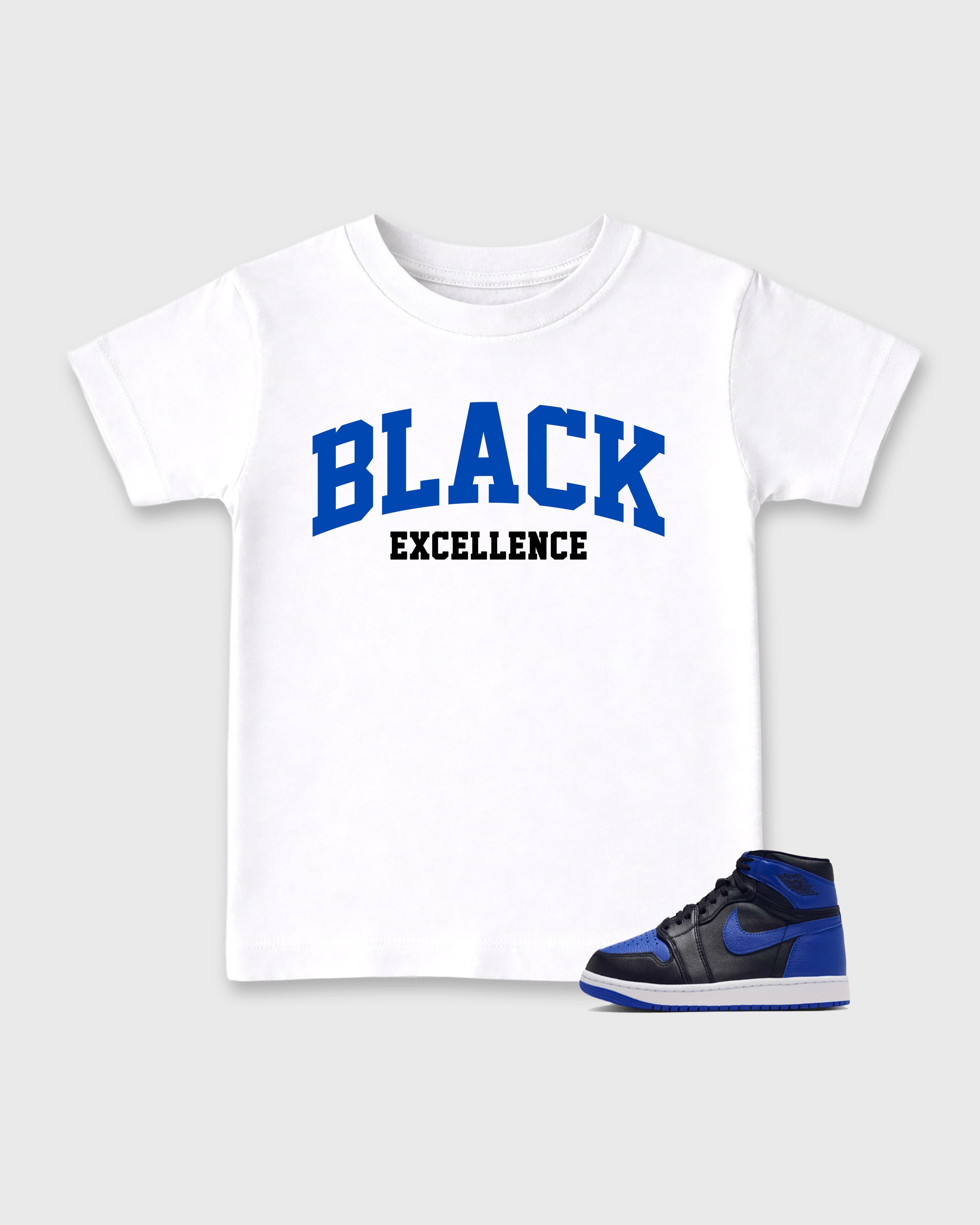 Varsity Black Excellence Baby & Kids Graphic T-Shirt featuring original artwork designed to match the Air Jordan 1 Royal. White 1 Kids Graphic Tee.
