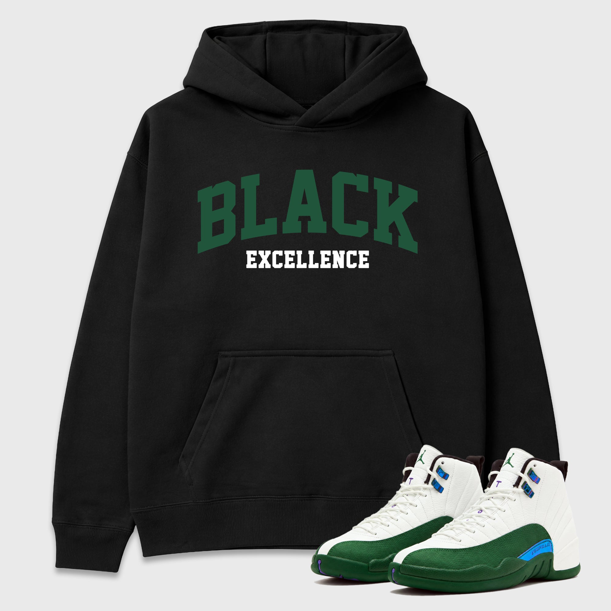 Varsity Black Excellence Graphic T-Shirt featuring original streetwear artwork designed to match the Air Jordan 12 Summit Green. Black 1 Graphic Tee.
