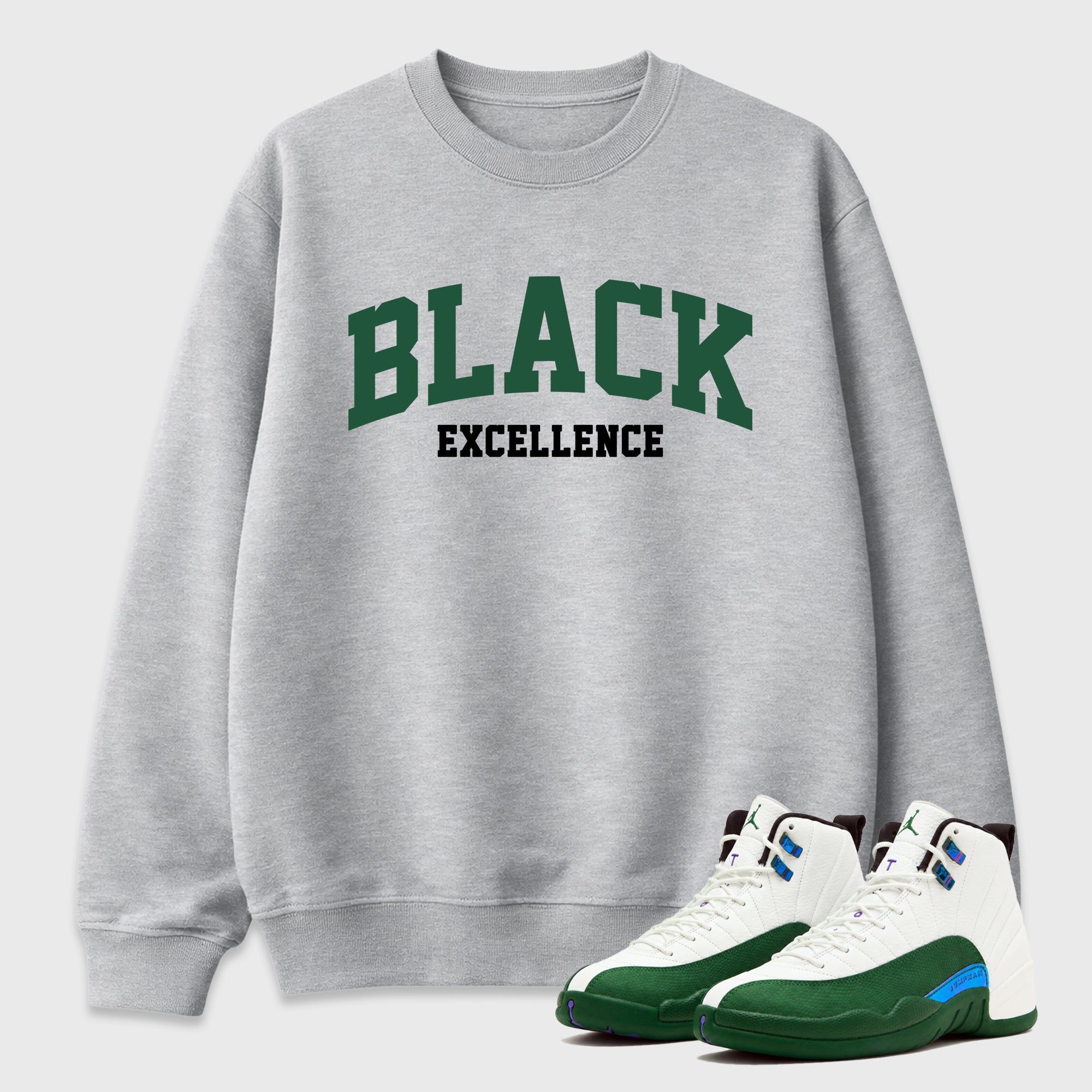 Varsity Black Excellence Graphic T-Shirt featuring original streetwear artwork designed to match the Air Jordan 12 Summit Green. Heather Grey 1 Graphic Tee.