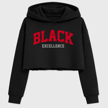 Varsity Black Excellence women’s crop tee designed to match the Air Jordan 4 Toro Bravo, featuring coordinated Black 2 options for a perfect streetwear vibe.
