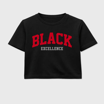 Varsity Black Excellence women’s crop tee designed to match the Air Jordan 4 Toro Bravo, featuring coordinated Black 2 options for a perfect streetwear vibe.