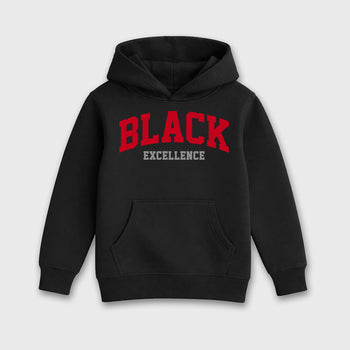 Varsity Black Excellence affordable baby and kids t-shirt designed to match the Air Jordan 4 Toro Bravo, featuring coordinated Black 2 options for the perfect little sneakerhead streetwear look.