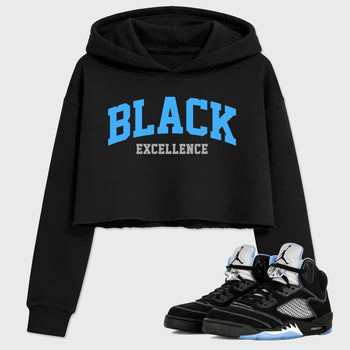 Varsity Black Excellence women’s crop tee designed to match the Air Jordan 5 Black University Blue, featuring coordinated Black 1 options for a perfect streetwear vibe.