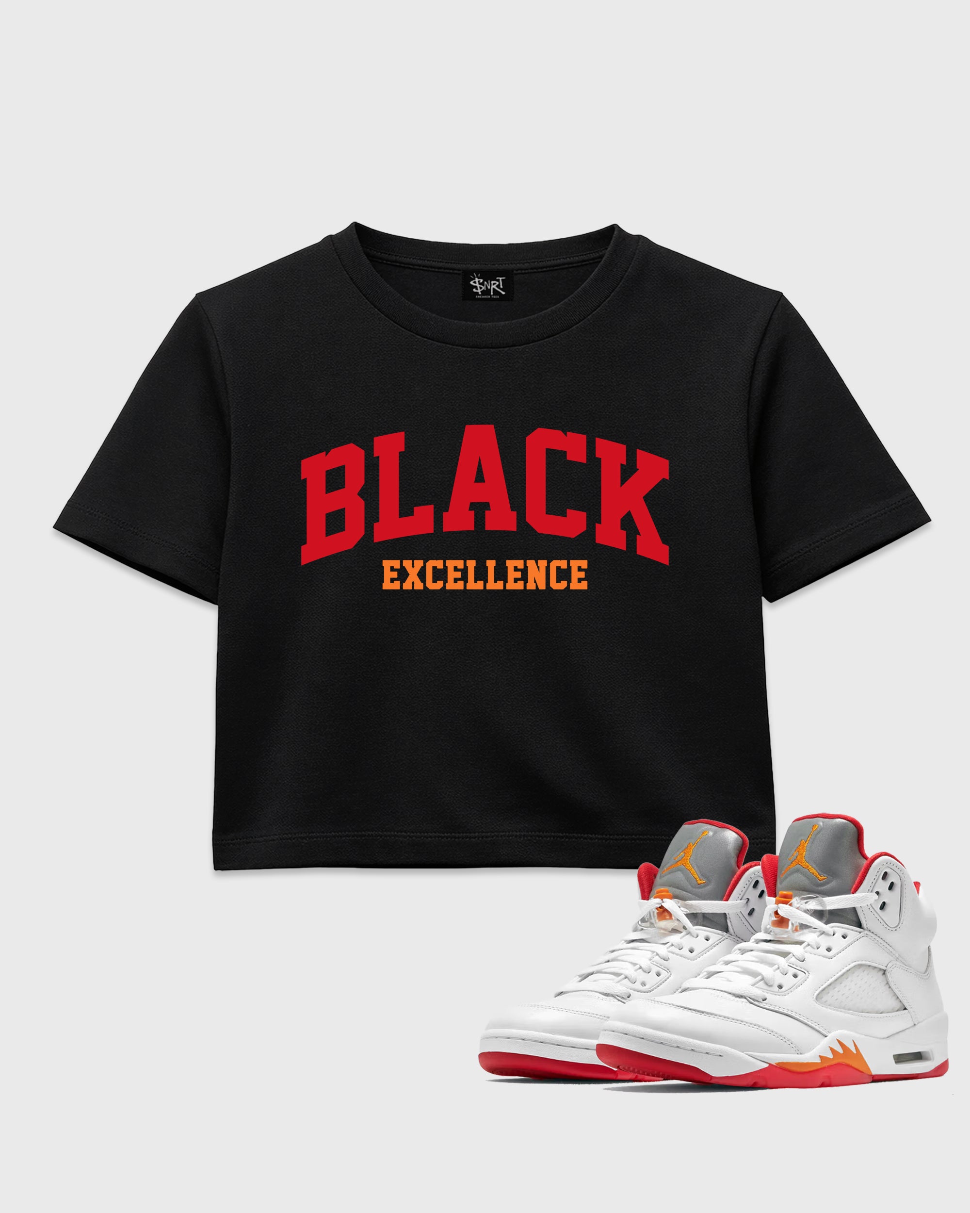 Varsity Black Excellence women’s crop tee designed to match the Air Jordan 5 Sunset, featuring coordinated Black 1 options for a perfect streetwear vibe.