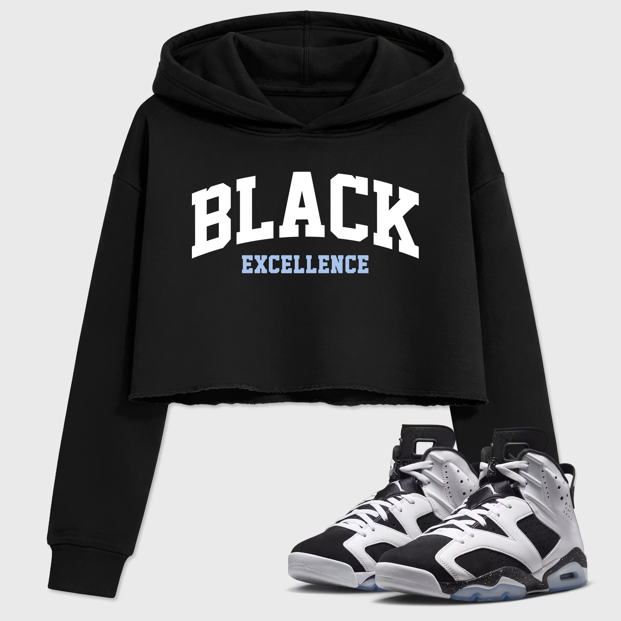 Varsity Black Excellence Women’s Graphic Crop Tee featuring original streetwear artwork designed to match the Air Jordan 6 Black and White. Black 1 Crop Tee.