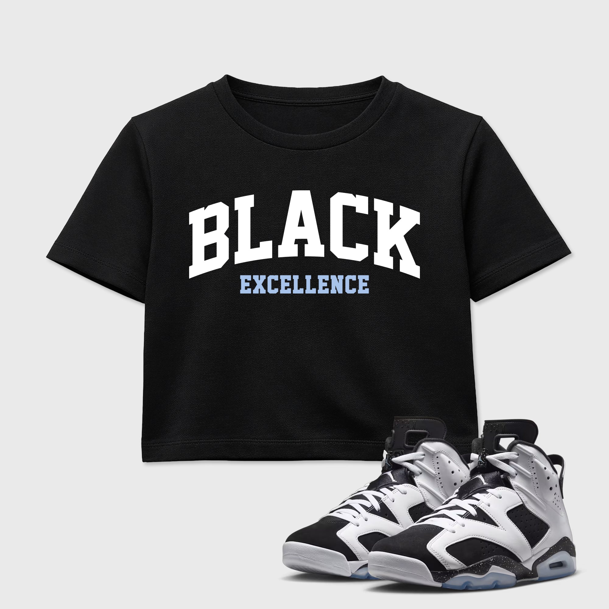 Varsity Black Excellence women’s crop tee designed to match the Air Jordan 6 Black and White, featuring coordinated Black 1 options for a perfect streetwear vibe.