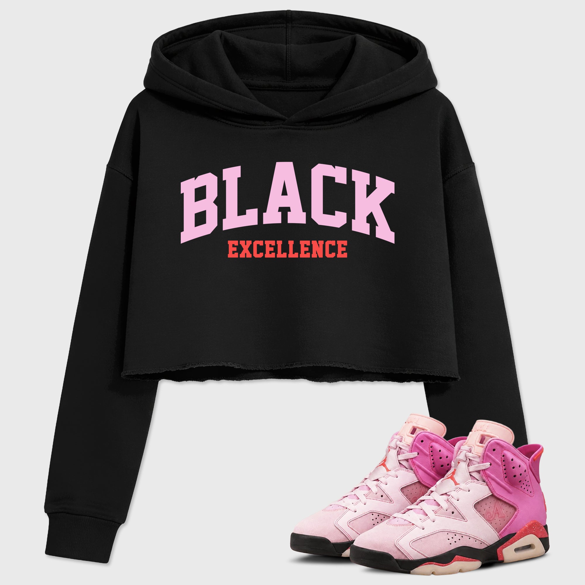 Varsity Black Excellence Women’s Graphic Crop Tee featuring original streetwear artwork designed to match the Air Jordan 6 Playful Pink. Black 1 Crop Tee.