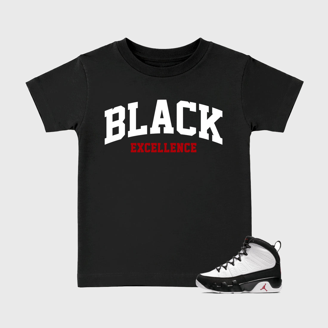 Varsity Black Excellence Baby & Kids Graphic T-Shirt featuring original artwork designed to match the Air Jordan 9 True Red. Black 1 Kids Graphic Tee.