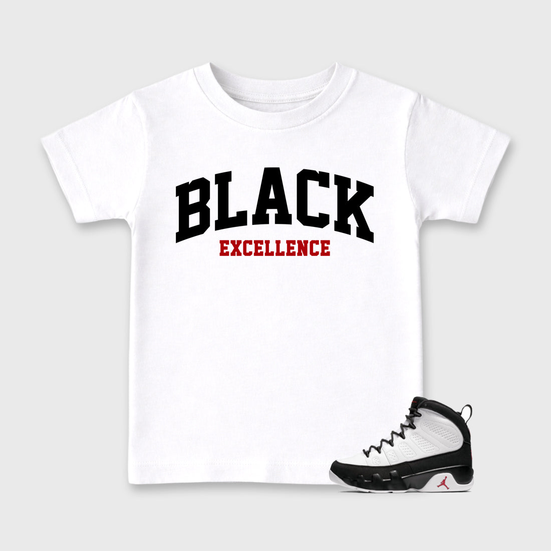 Varsity Black Excellence Baby & Kids Graphic T-Shirt featuring original artwork designed to match the Air Jordan 9 True Red. White 1 Kids Graphic Tee.