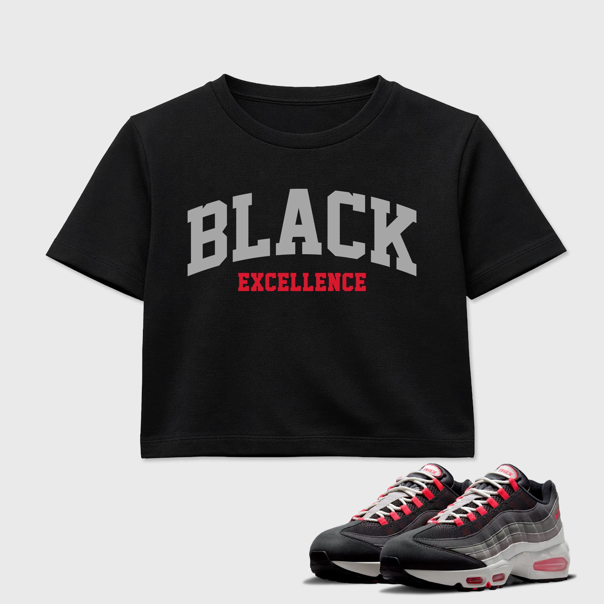 Varsity Black Excellence women’s crop tee designed to match the Air Max 95 Reverse Solar Red, featuring coordinated Black 1 options for a perfect streetwear vibe.