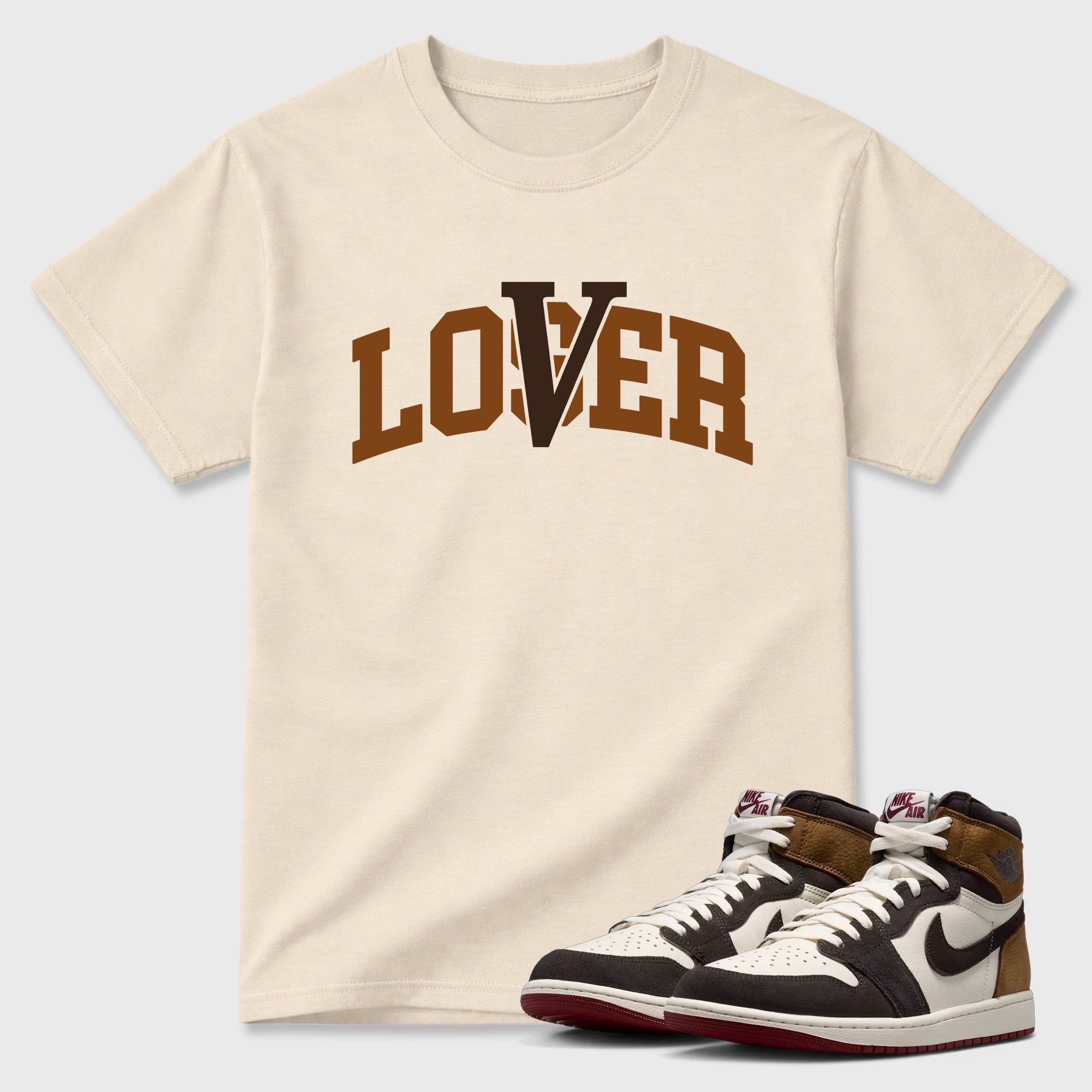 Varsity Loser Lover Graphic T-Shirt featuring original streetwear artwork designed to match the Air Jordan 1 Love Letter. Natural 1 Graphic T-Shirt.