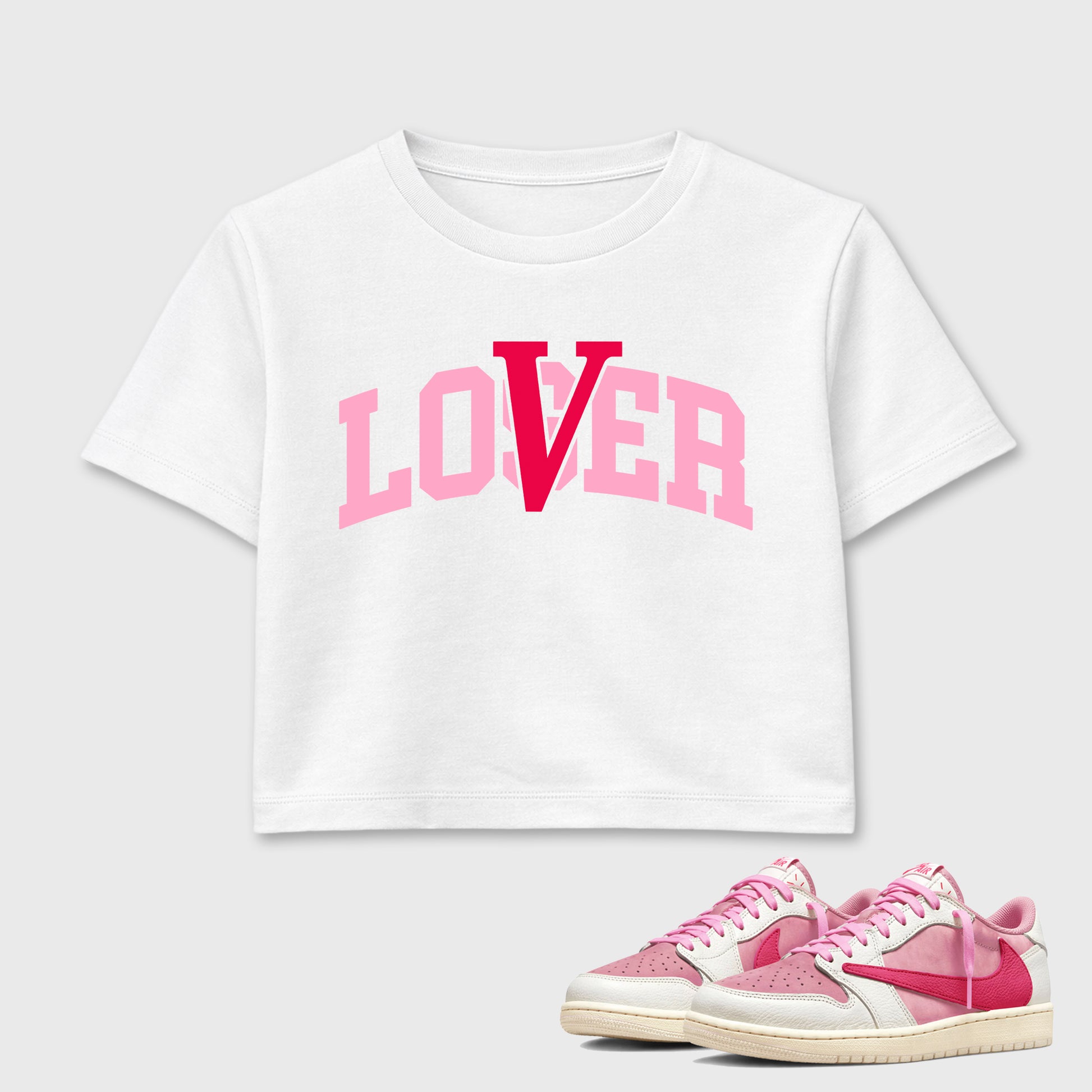 Varsity Loser Lover women’s crop tee designed to match the Air Jordan 1 Travis Scott Tropical Pink, featuring coordinated White 1 options for a perfect streetwear vibe.
