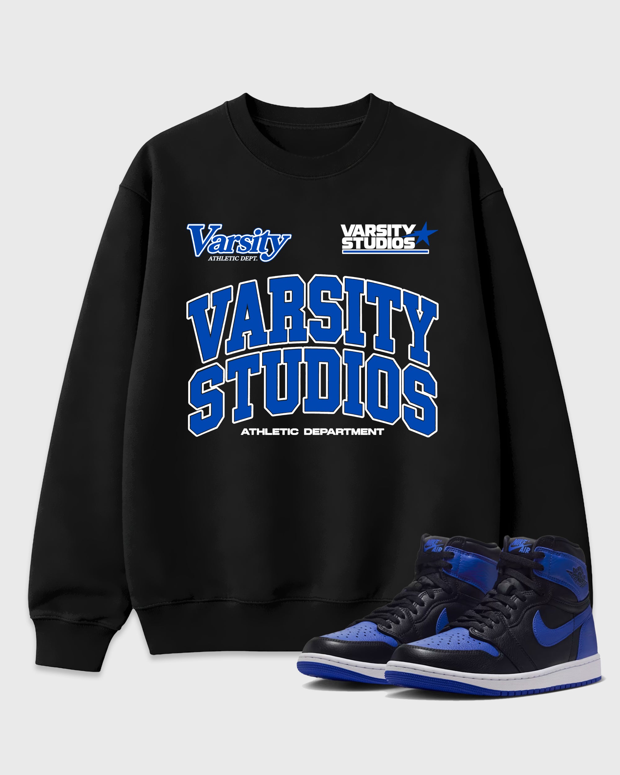 Varsity Studios Graphic T-Shirt featuring original streetwear artwork designed to match the Air Jordan 1 High OG 'Royal'. Black 1 Graphic Tee.