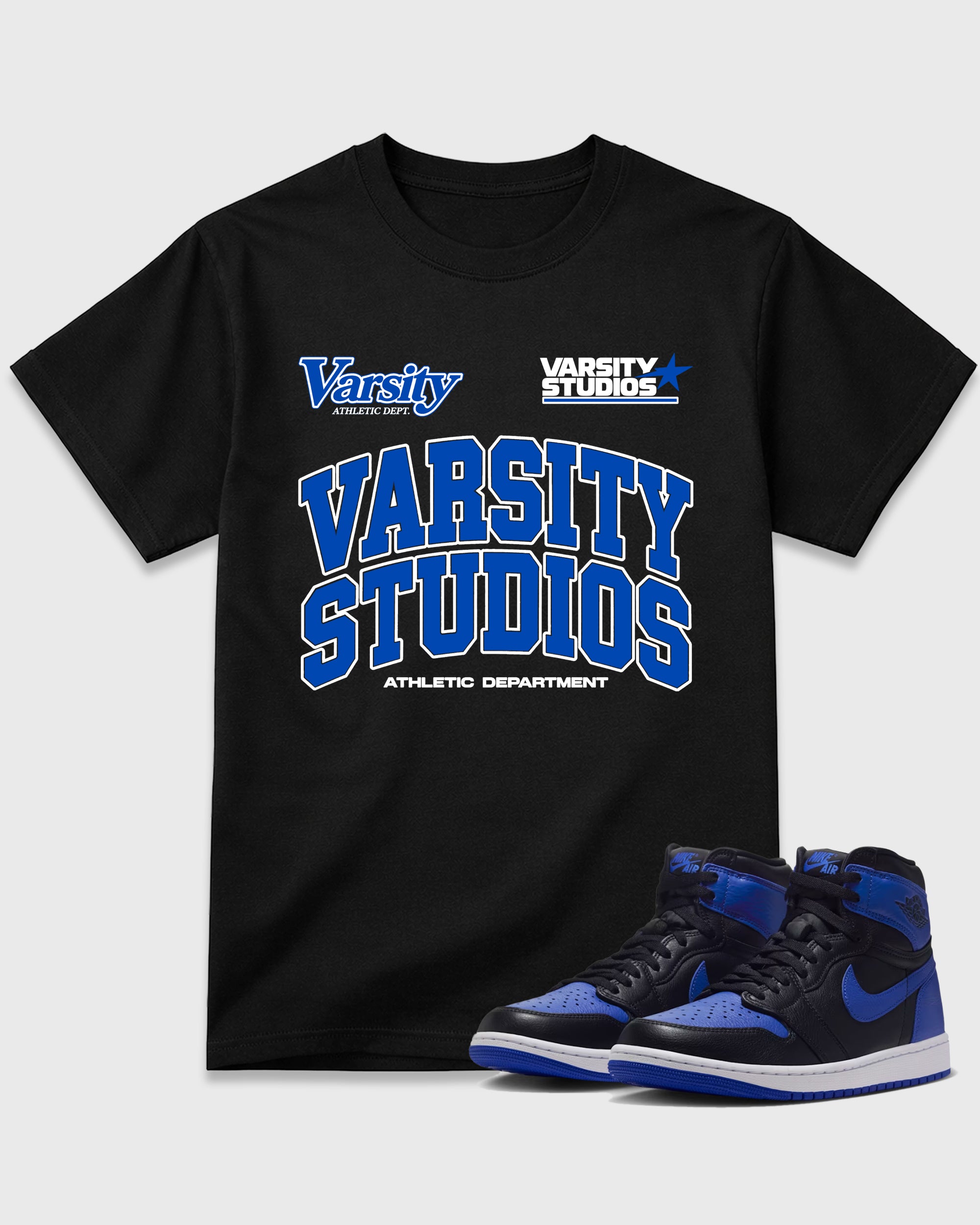 Varsity Studios Graphic T-Shirt featuring original streetwear artwork designed to match the Air Jordan 1 High OG 'Royal'. Black 1 Graphic T-Shirt.