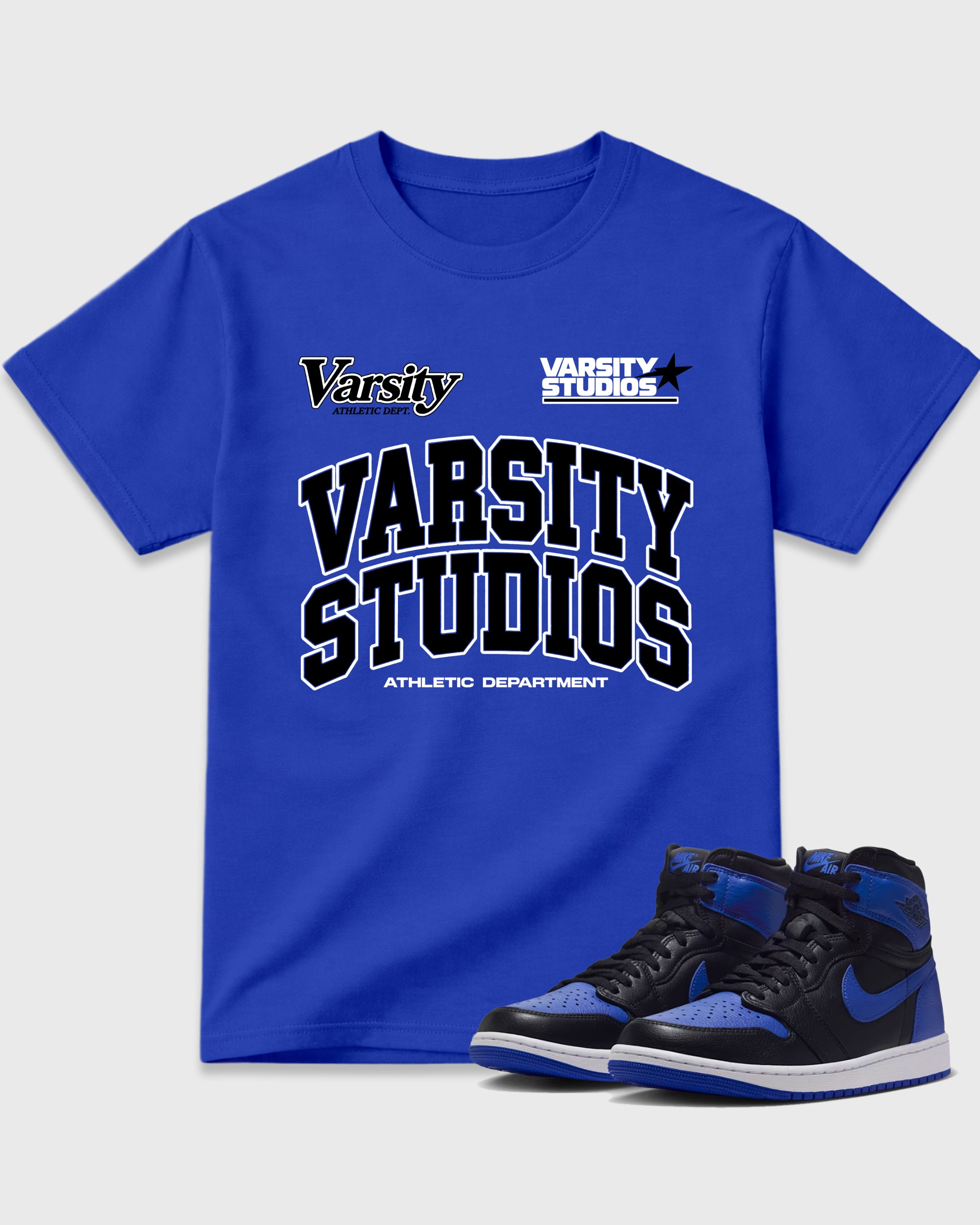 Varsity Studios Graphic T-Shirt featuring original streetwear artwork designed to match the Air Jordan 1 High OG 'Royal'. Royal Blue 1 Graphic T-Shirt.
