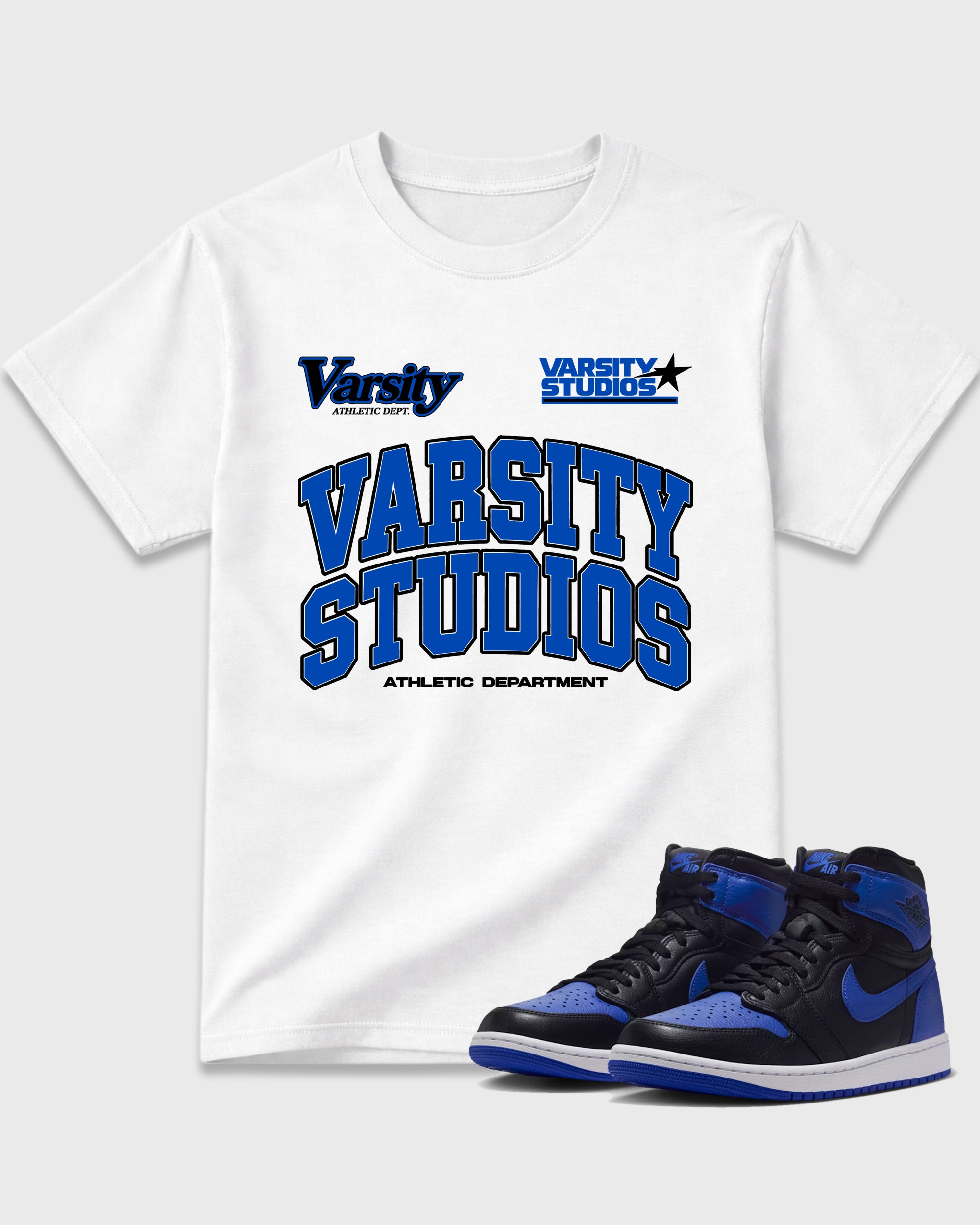 Varsity Studios Graphic T-Shirt featuring original streetwear artwork designed to match the Air Jordan 1 High OG 'Royal'. White 1 Graphic T-Shirt.