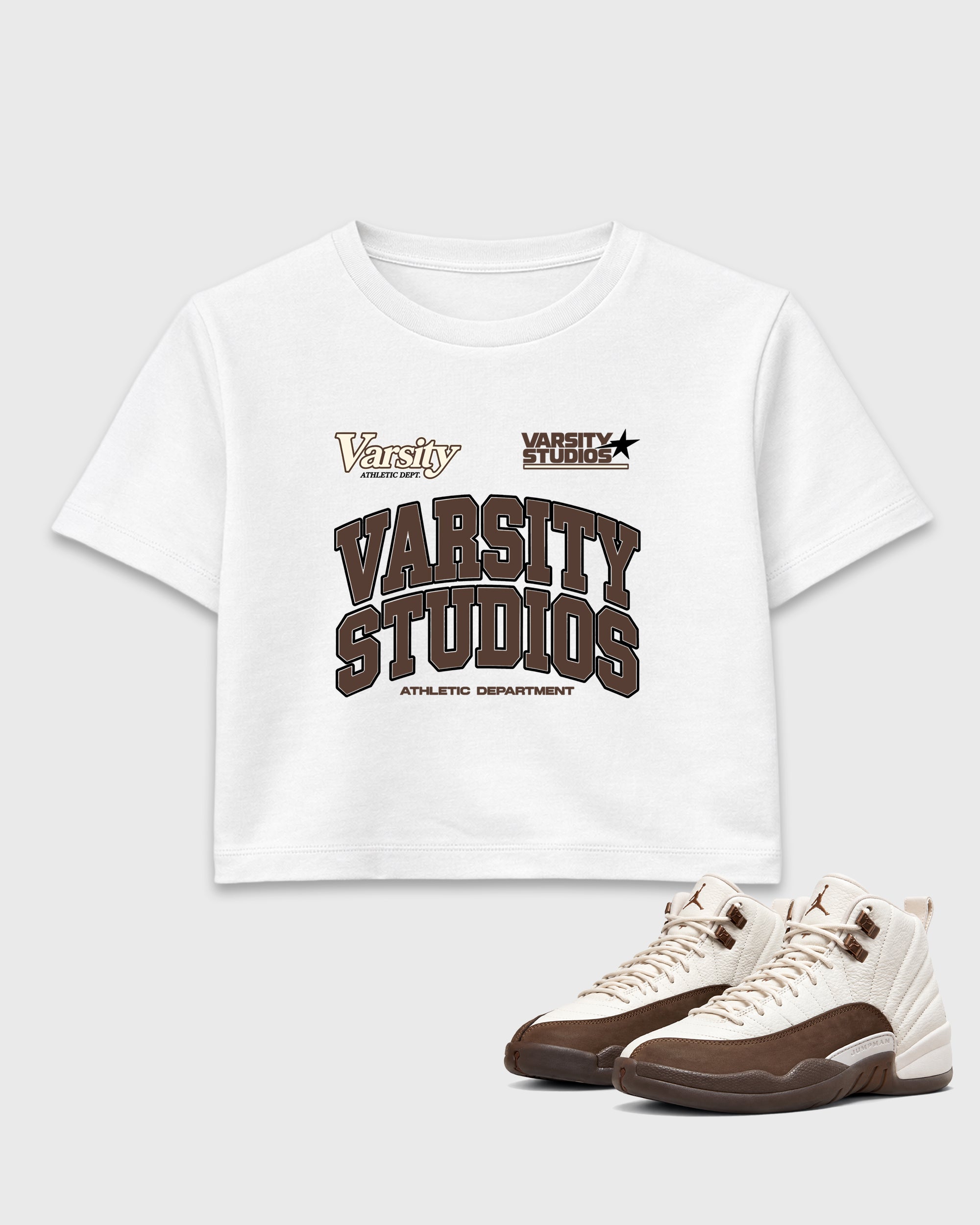 Varsity Studios women’s crop tee designed to match the Air Jordan 12 Fireside, featuring coordinated White 1 options for a perfect streetwear vibe.