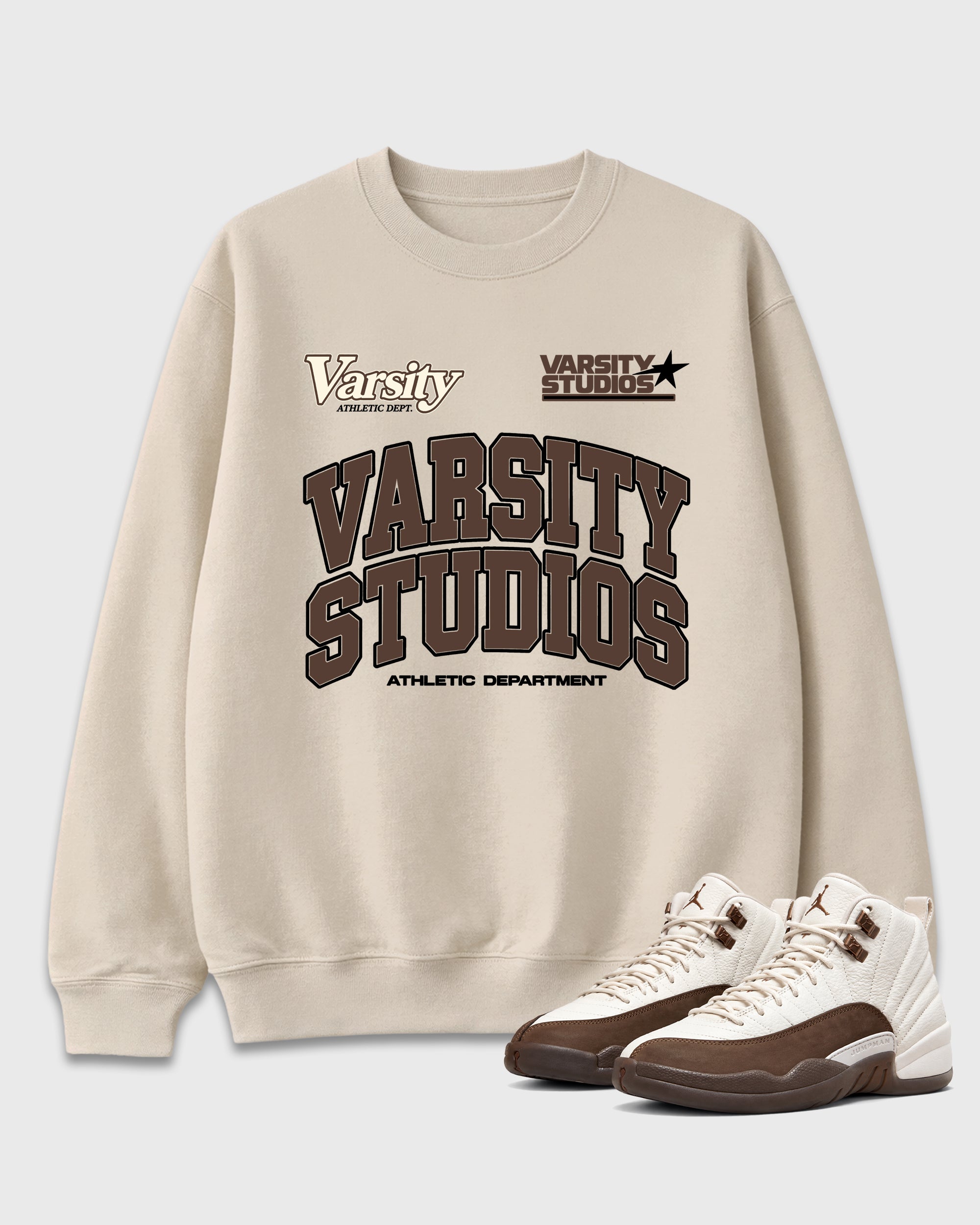 Varsity Studios Graphic T-Shirt featuring original streetwear artwork designed to match the Air Jordan 12 Fireside. Natural 1 Graphic Tee.