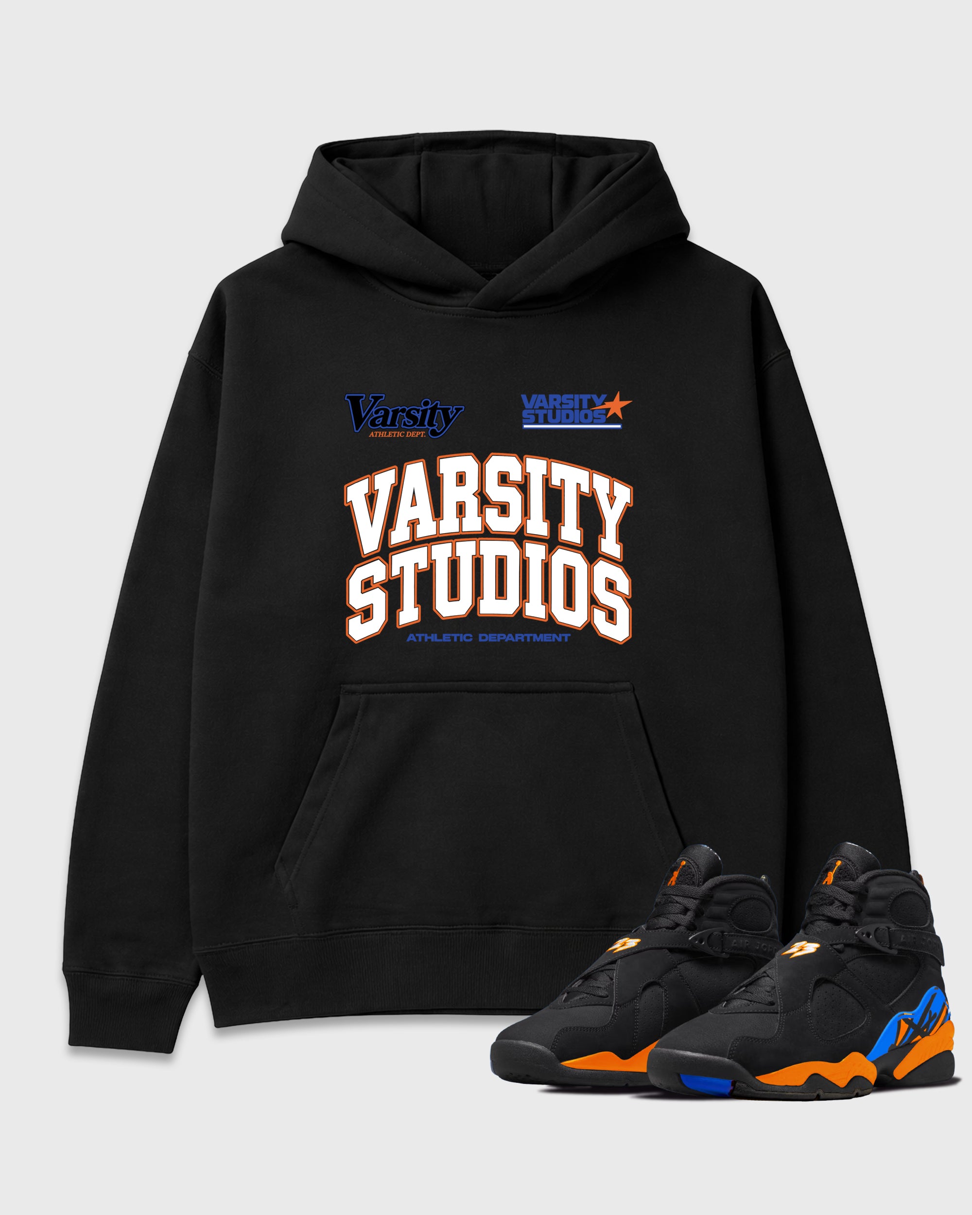 Varsity Studios Graphic T-Shirt featuring original streetwear artwork designed to match the Air Jordan 8 Knicks. Black 1 Graphic Tee.