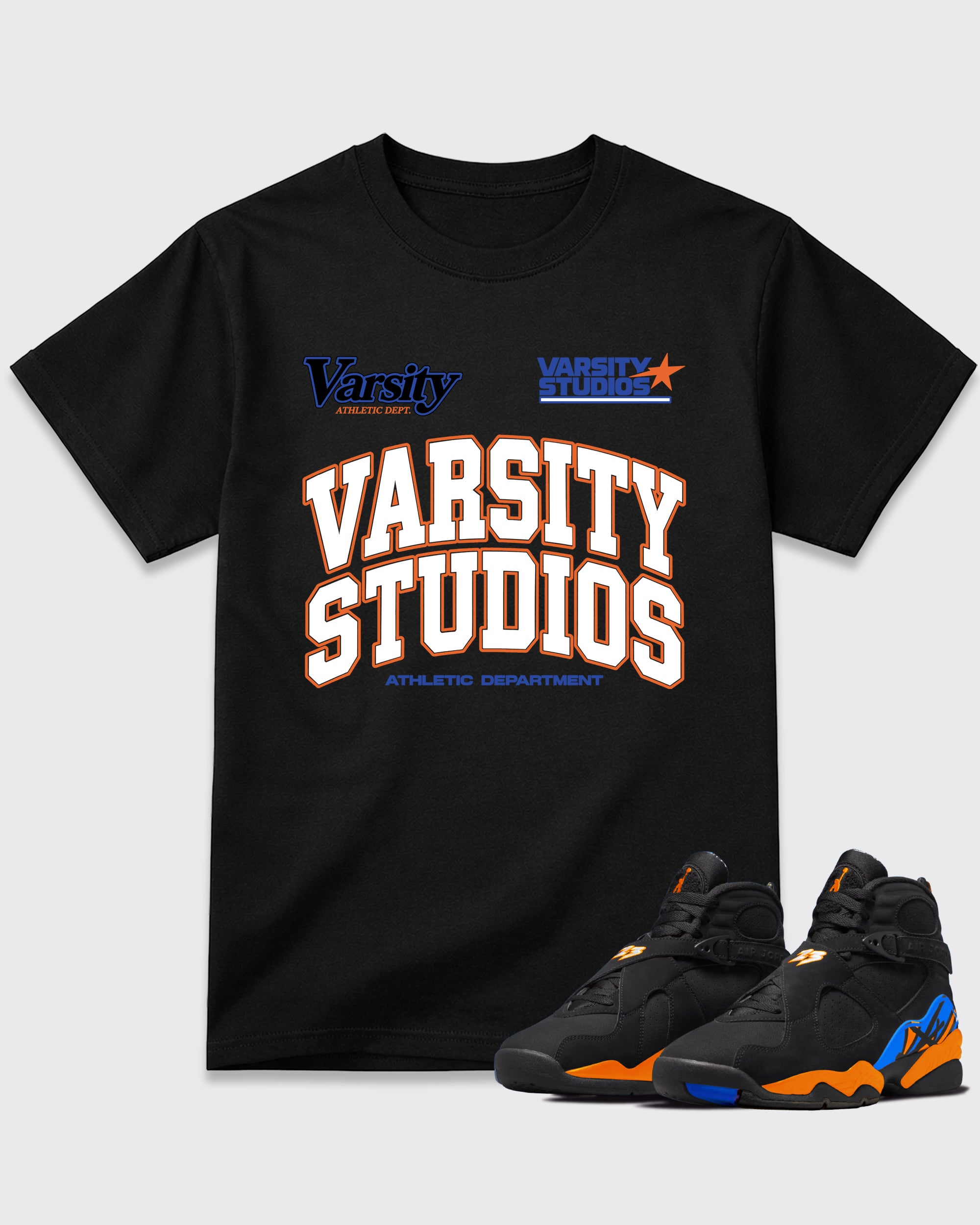 Varsity Studios Graphic T-Shirt featuring original streetwear artwork designed to match the Air Jordan 8 Knicks. Black 1 Graphic T-Shirt.