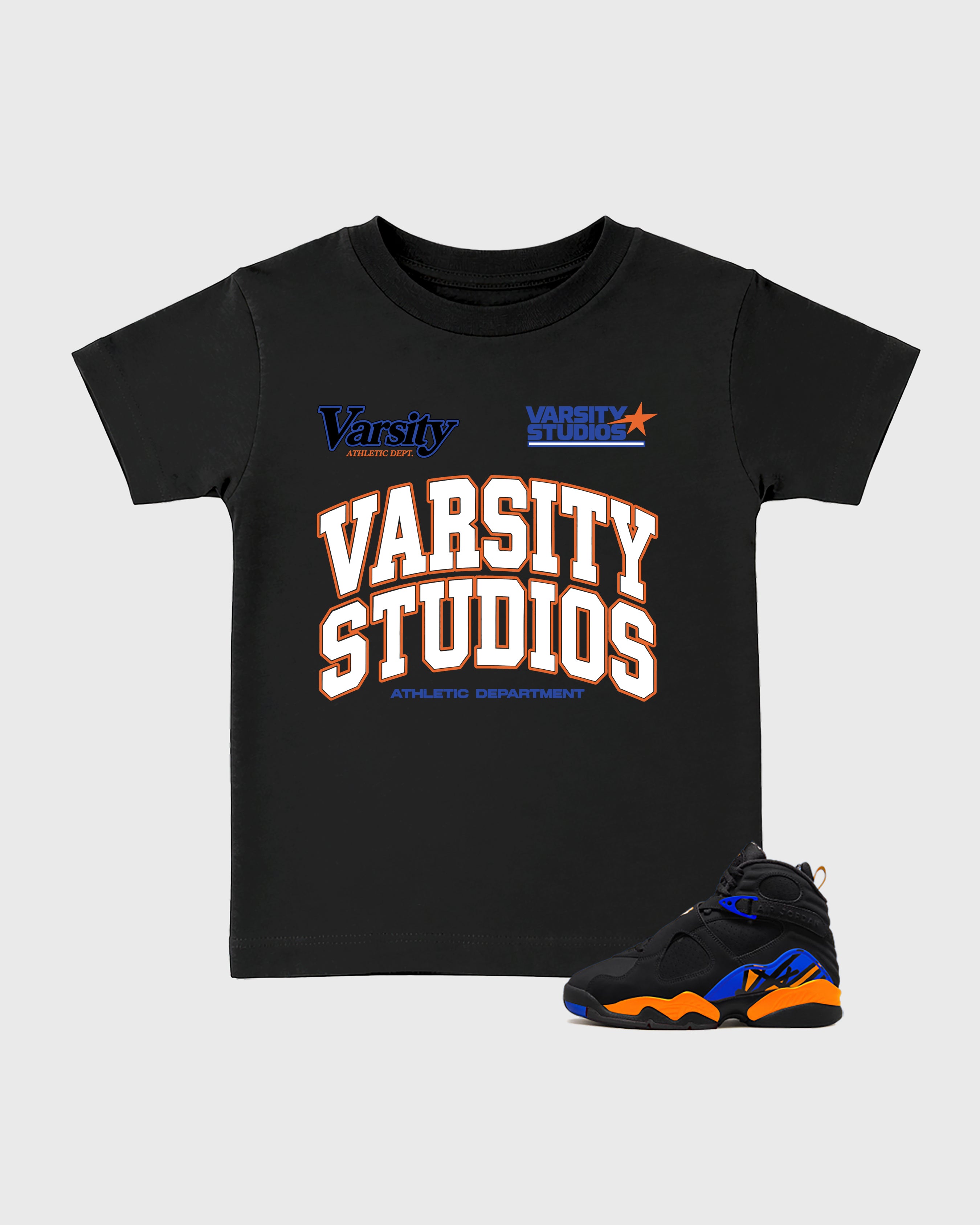 Varsity Studios Baby & Kids Graphic T-Shirt featuring original artwork designed to match the Air Jordan 8 Knicks. Black 1 Kids Graphic Tee.