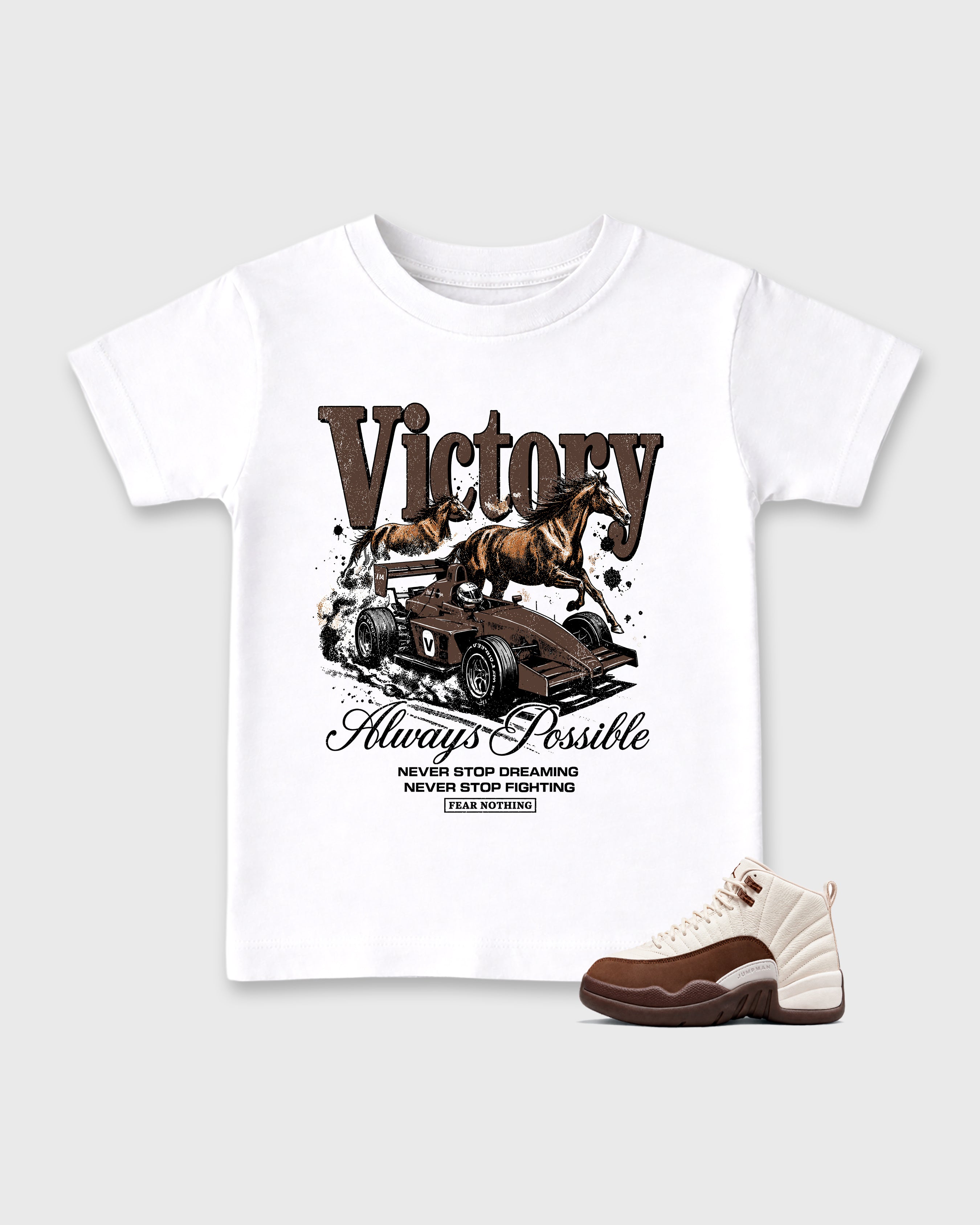 Victory Baby & Kids Graphic T-Shirt featuring original artwork designed to match the Air Jordan 12 Fireside. White 1 Kids Graphic Tee.